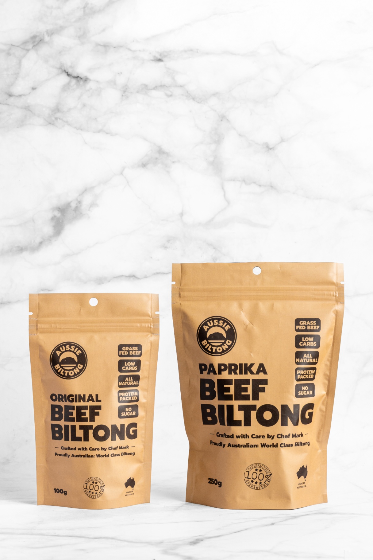 Original and Paprika Aussie Biltong packs on a clean backdrop, biltong snacks, high protein snacks, healthy meat snacks, biltong nutrition, air dried beef