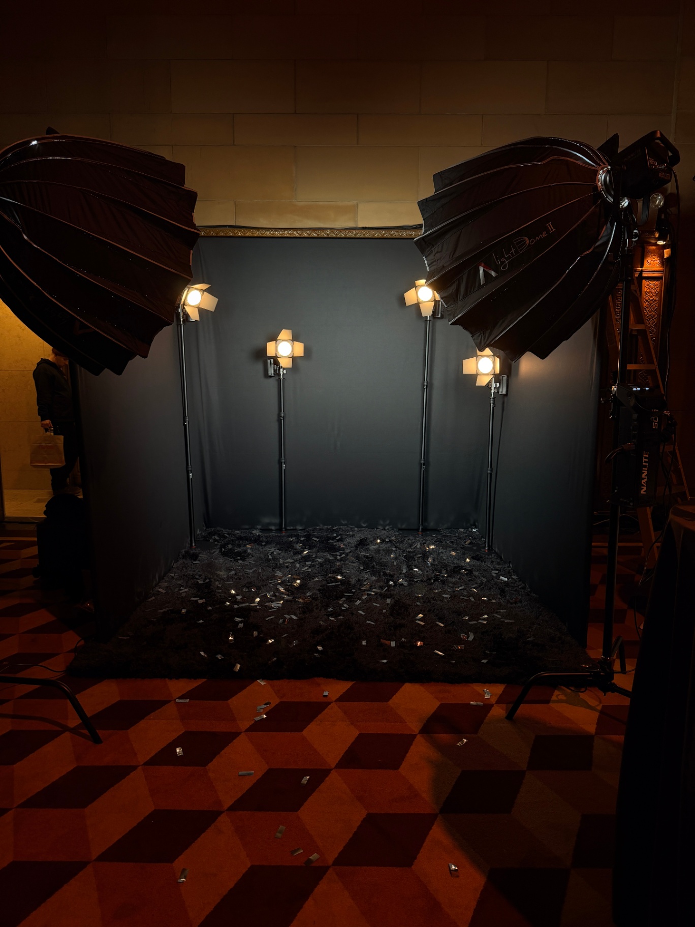 Law & Order 25 Setup — wide shot with cinematic lighting and confetti floor