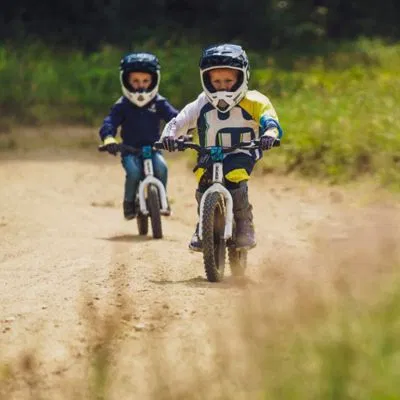 The Ultimate Guide to Off-Road Vehicles in Reno: Everything You Need for Tahoe Trails 3 Two young riders in full protective gear on electric balance bikes, perfect for introducing the next generation to Northern Nevada riding.
