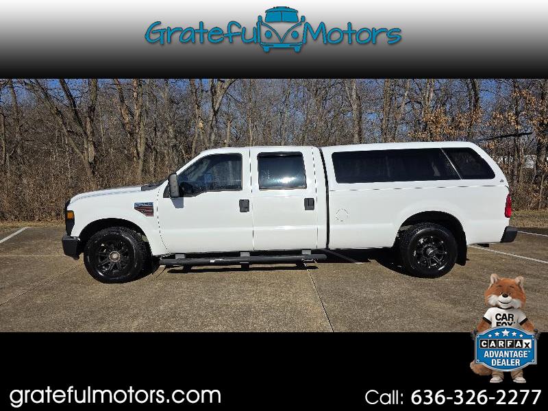 White Ford Super Duty crew cab truck