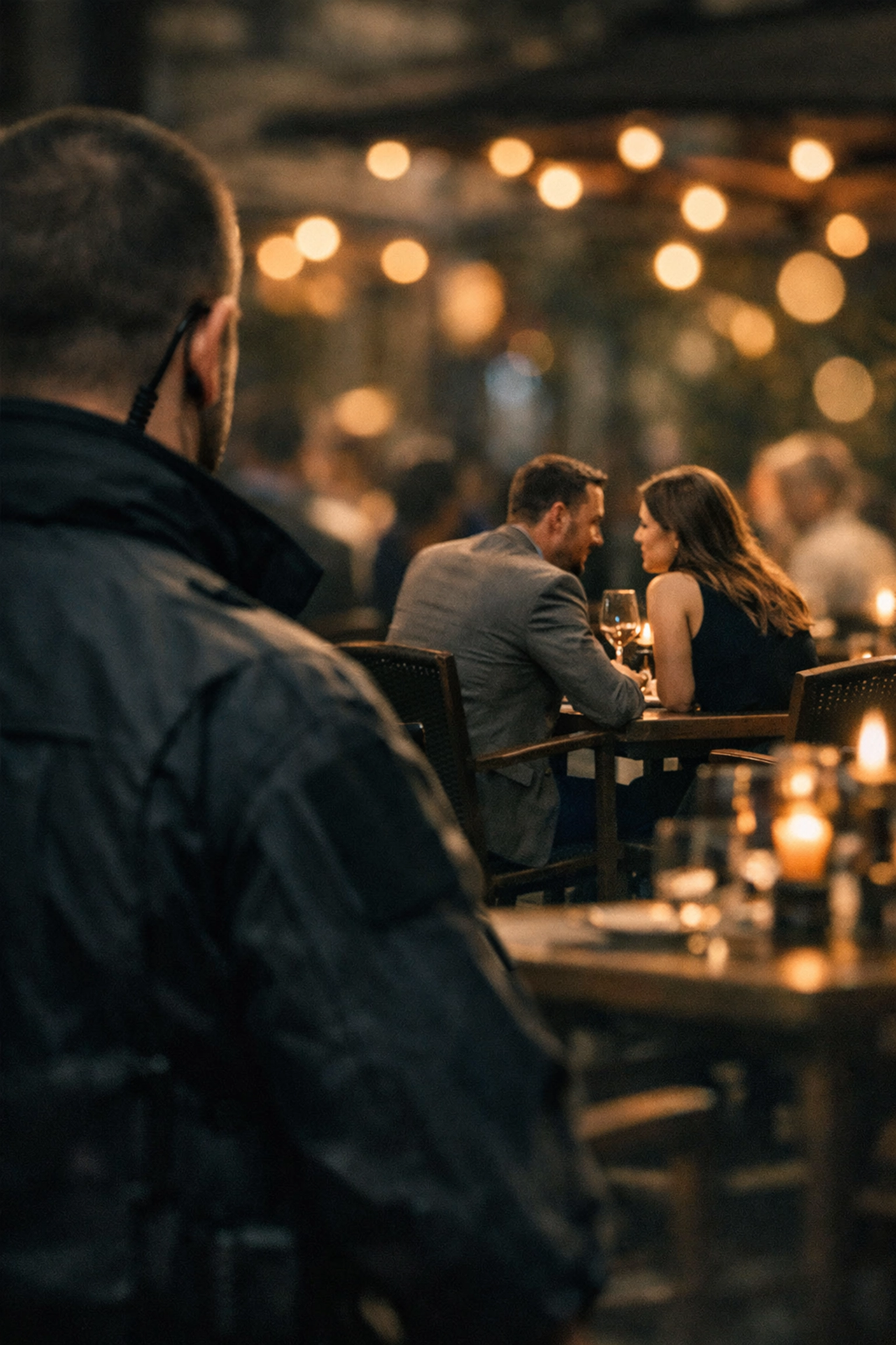 Professional bodyguard providing discrete shadow protection for dating couple in Medellin