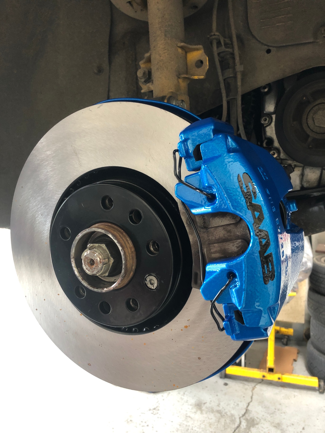 Red SAAB brake caliper powder coated for a clean, high-contrast performance look behind most wheel designs.