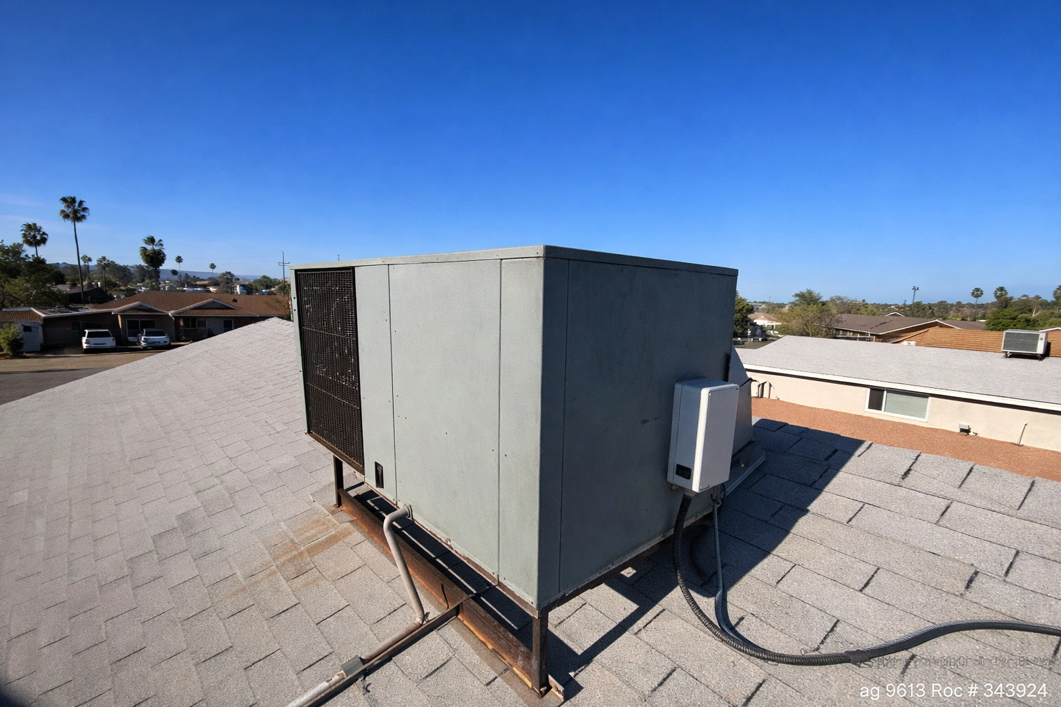 Rooftop AC unit in Arizona showing the typical weathered condition after a long summer