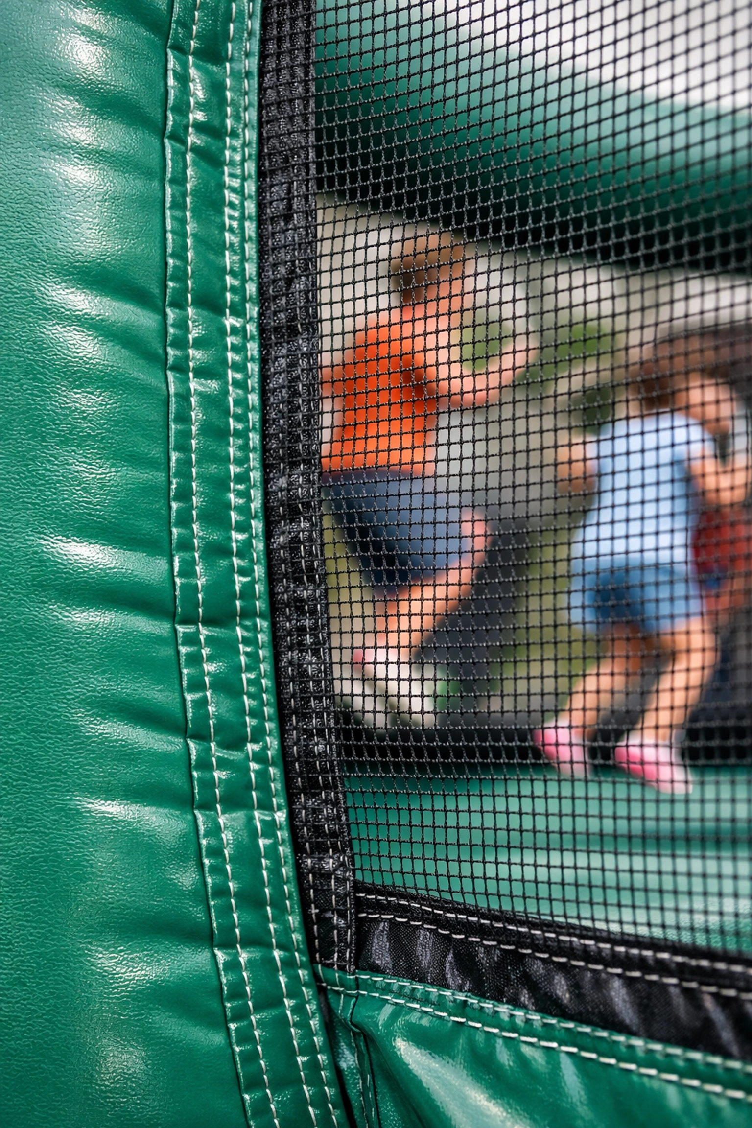 Detailed view of clean safety netting and durable vinyl on a professional bounce house rental.