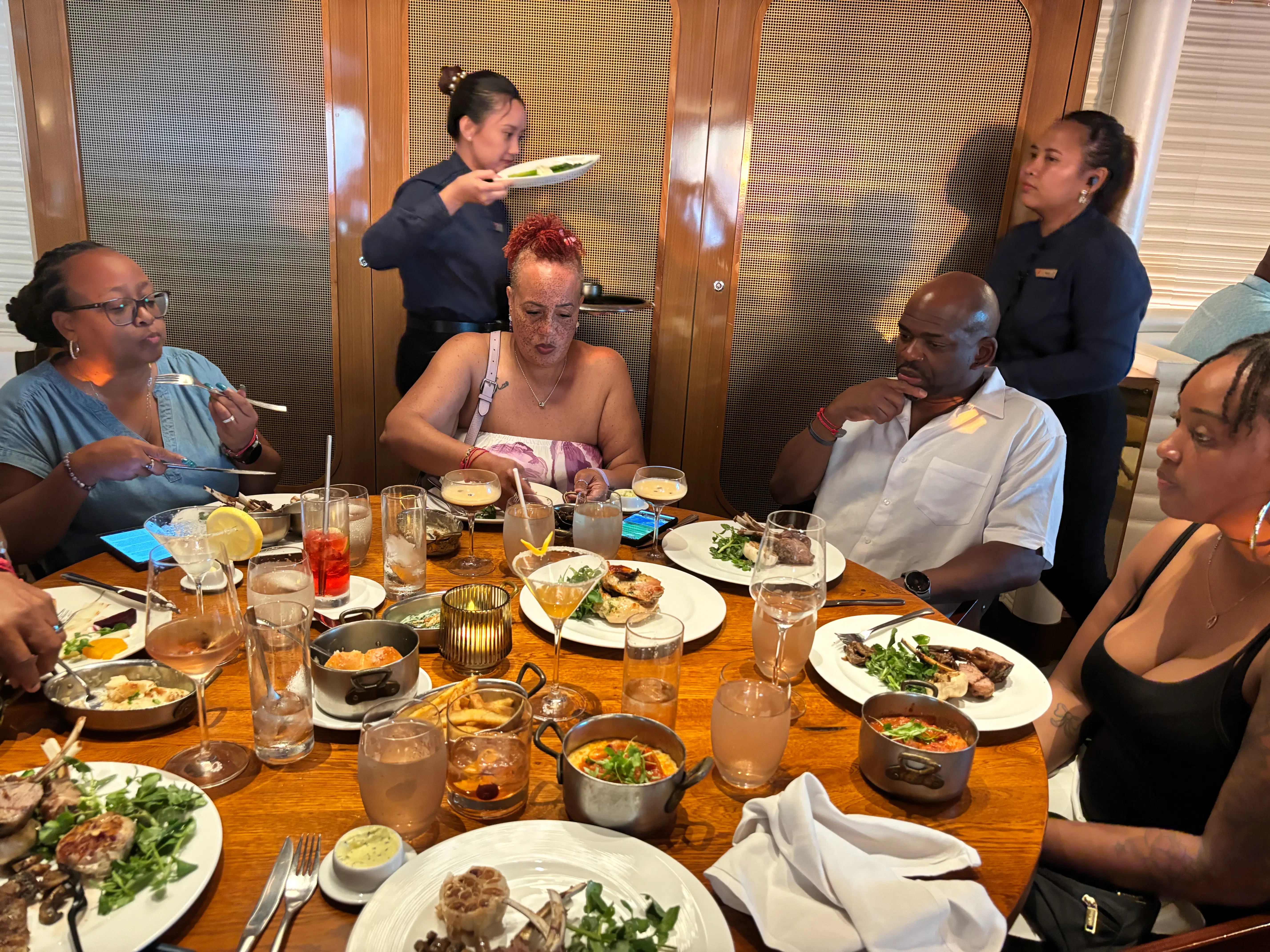 Dinner hits different when the table is full of your people—good food, easy laughs, and that “we really outside” kind of glow.