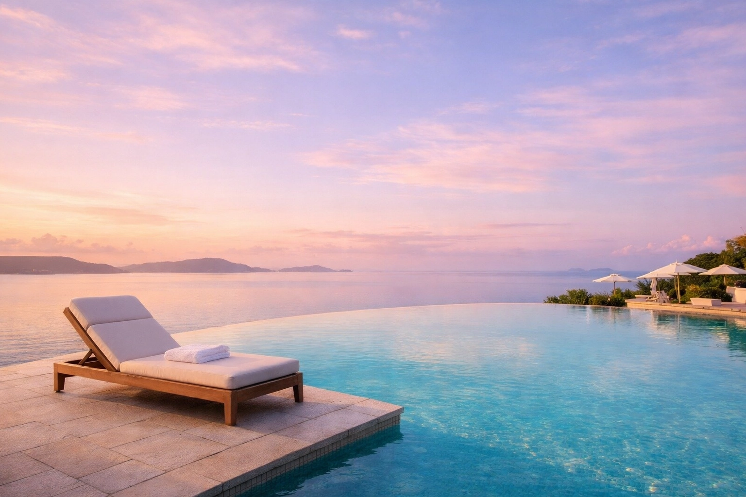 Secluded infinity pool at a luxury boutique hotel at dawn, highlighting unforgettable travel experiences.