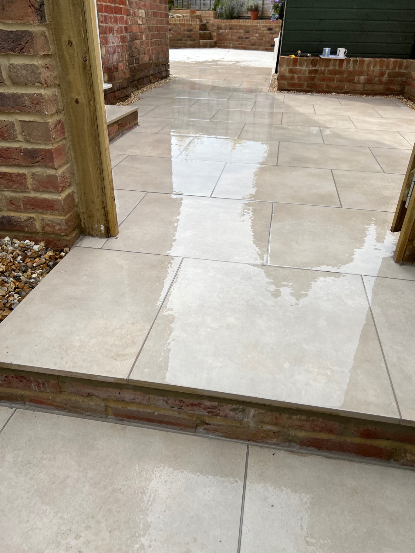 Recently completed outdoor tiled patio area