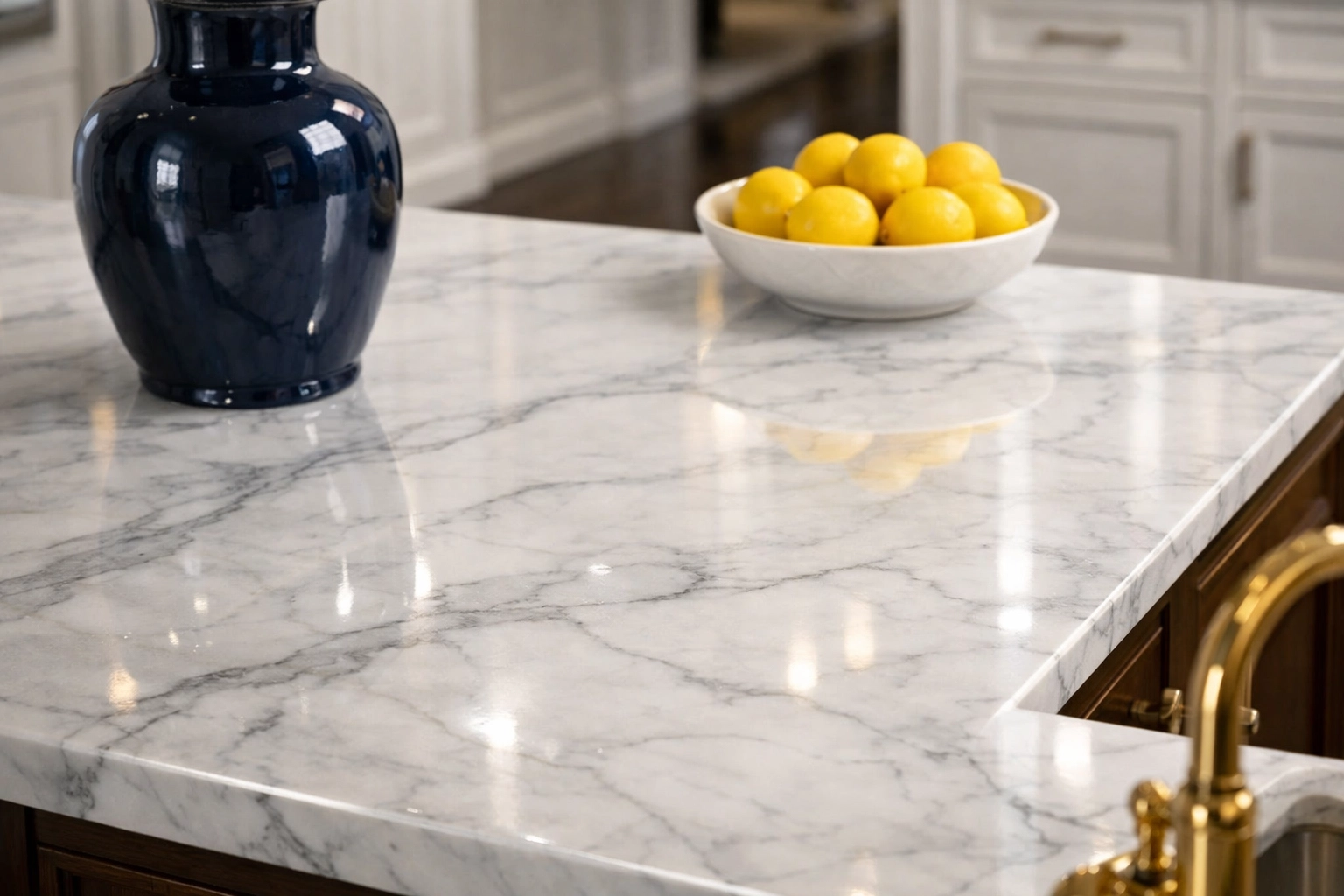 Polished marble kitchen island in a Groton home showcasing streak-free white-glove cleaning services.