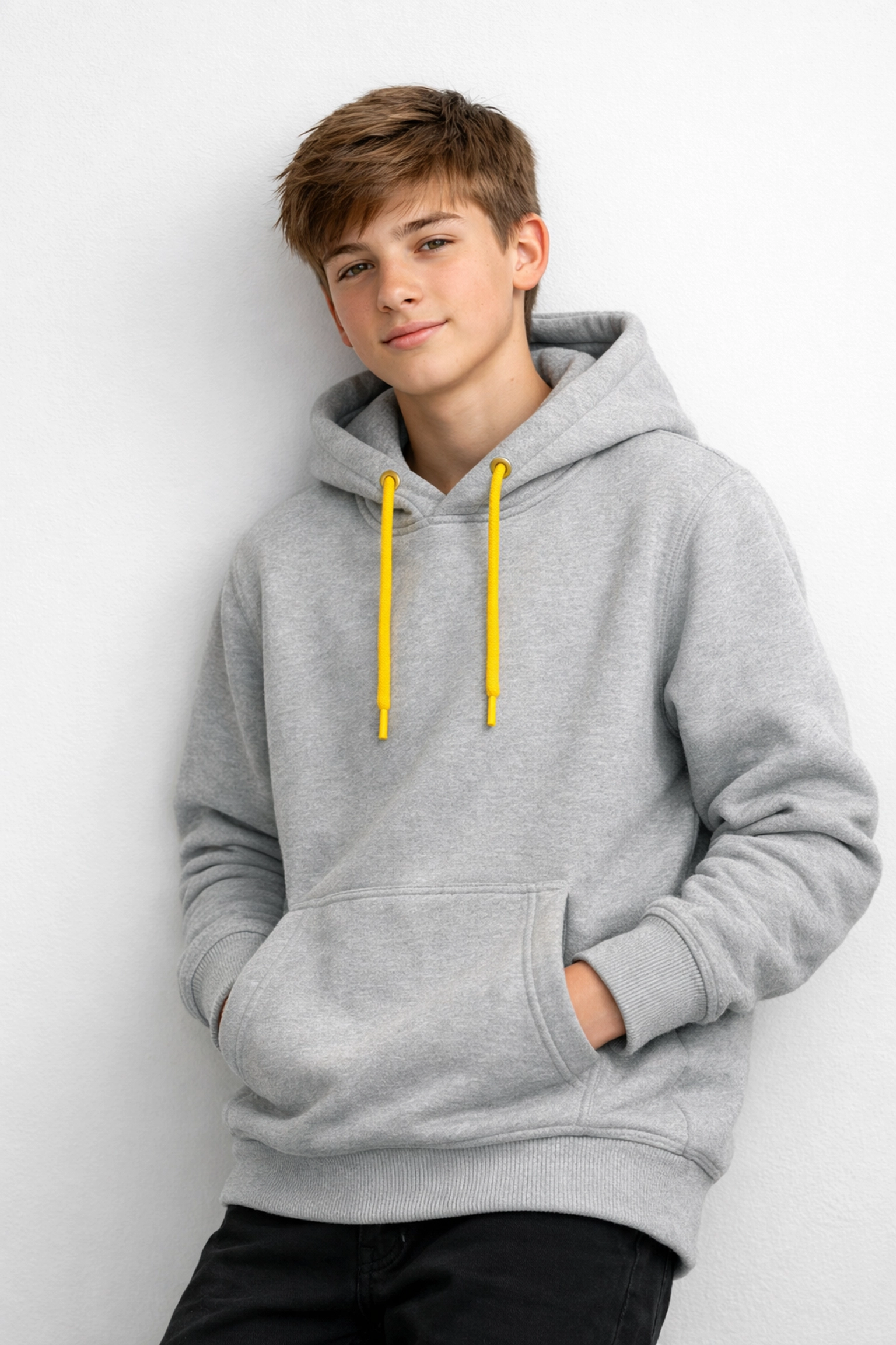 Stylish teenager wearing a premium light grey custom hoodie with high-quality screen printing.
