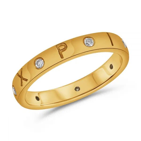 An engraved gold band ring with diamonds, representing a personalized and modern approach to fine jewelry.