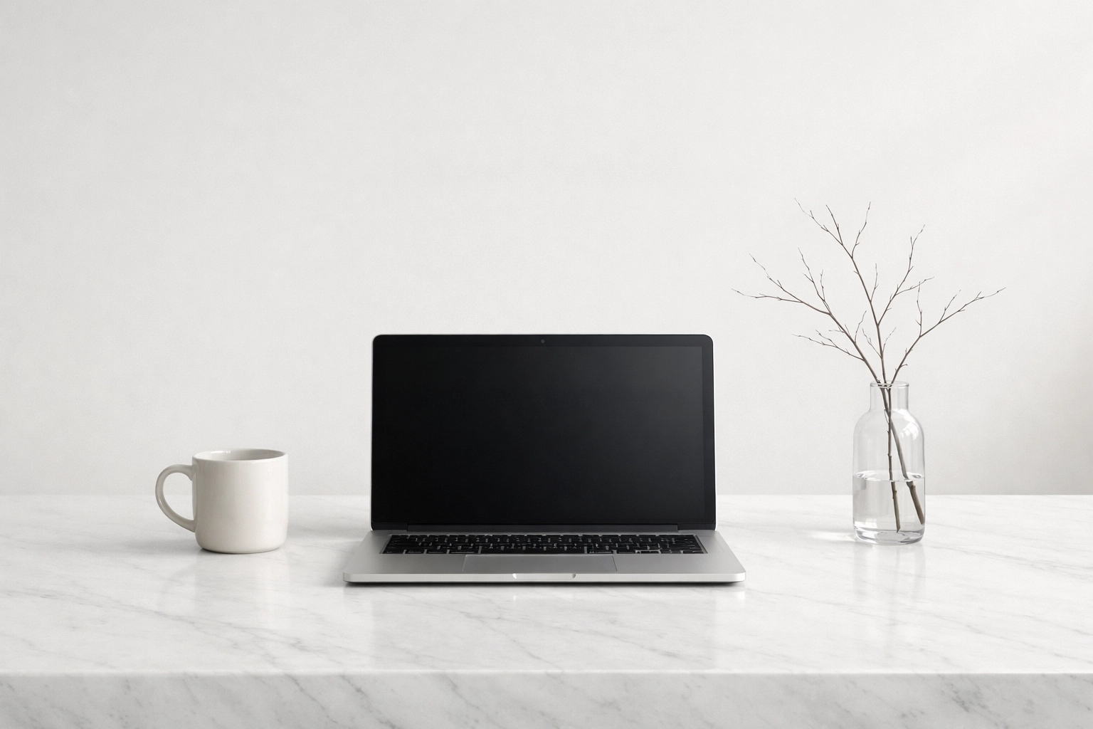 A seamless hotel booking experience displayed on a laptop in a clean, professional hospitality workspace.