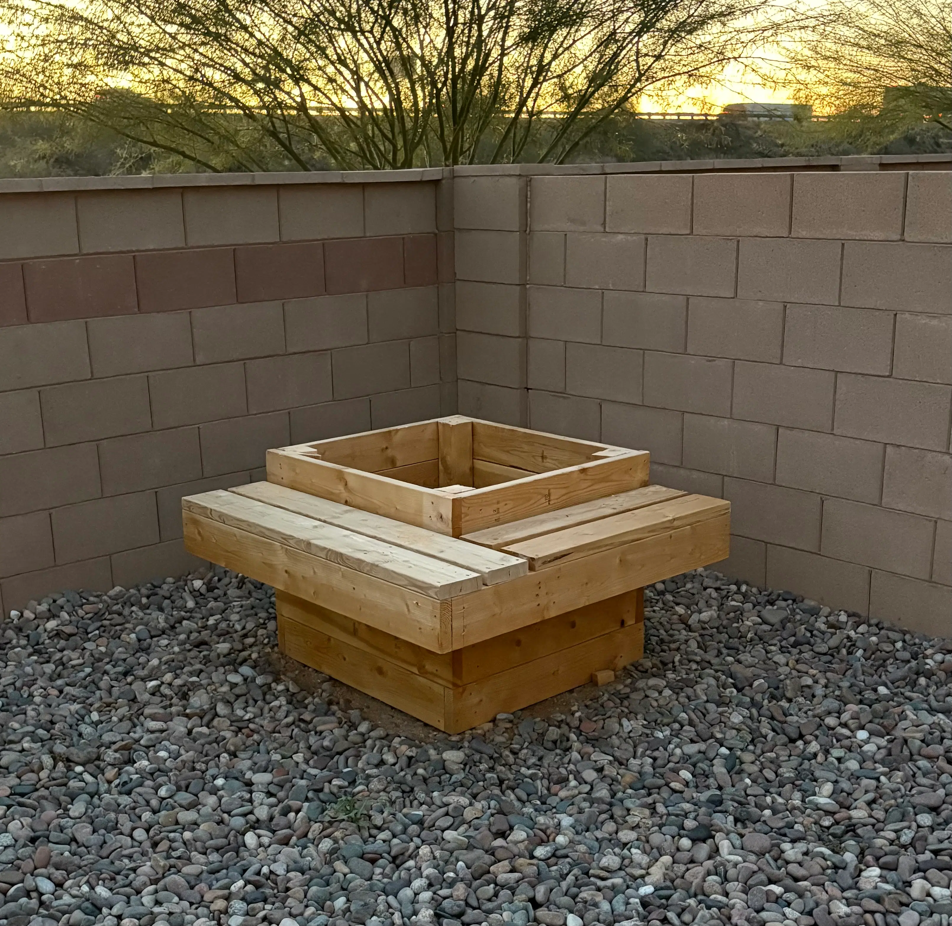 Construction details of a rectangular custom planter box in a Tucson desert backyard setting