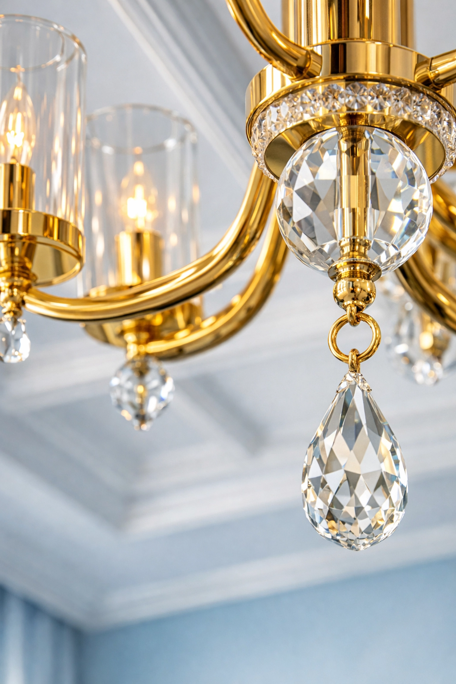 Sparkling clean chandelier and ceiling showing the thoroughness of deep cleaning Newton MA.