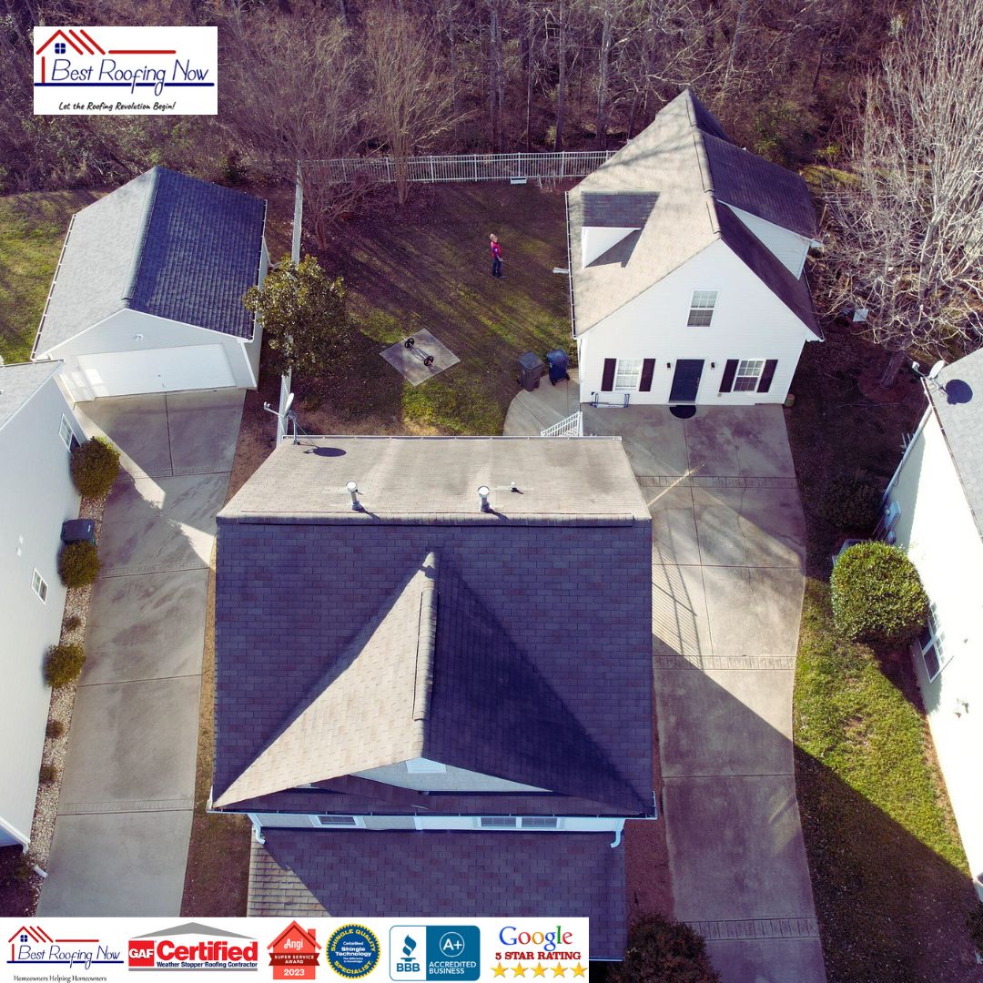 Aerial view of residential roofs with Best Roofing Now branding