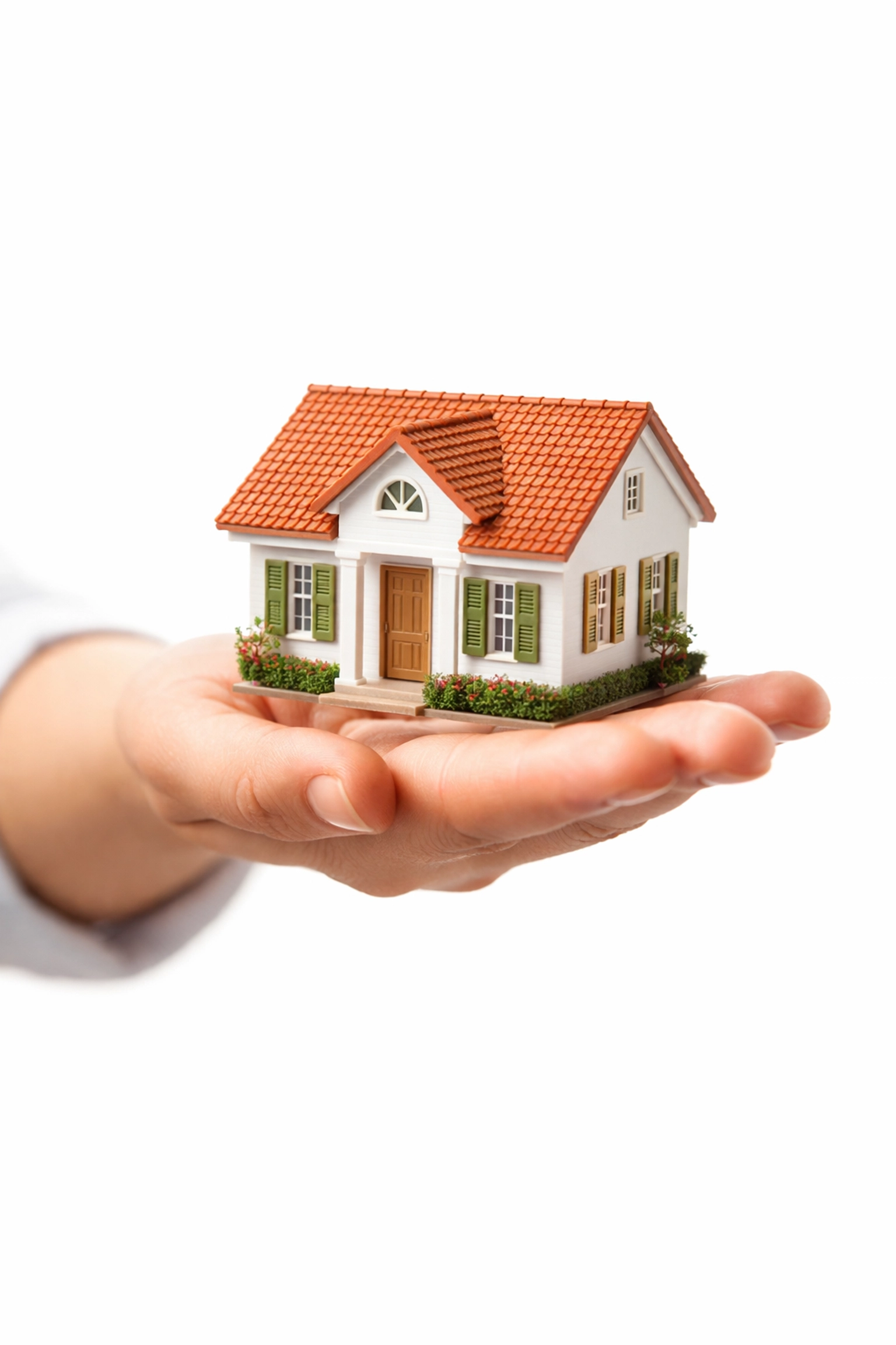 Hand holding miniature Florida home representing options to sell house fast