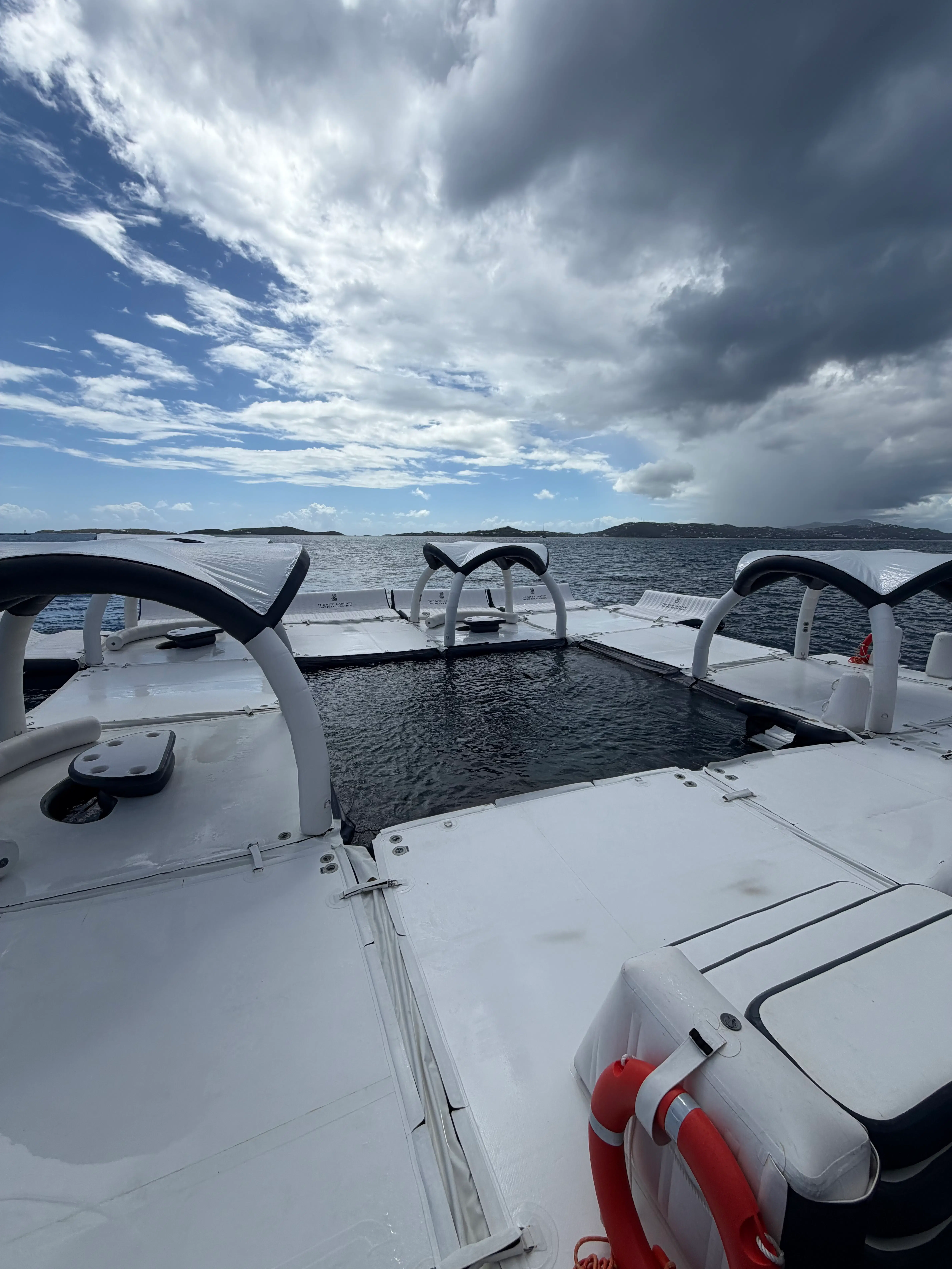 a boat with a cloudy sky