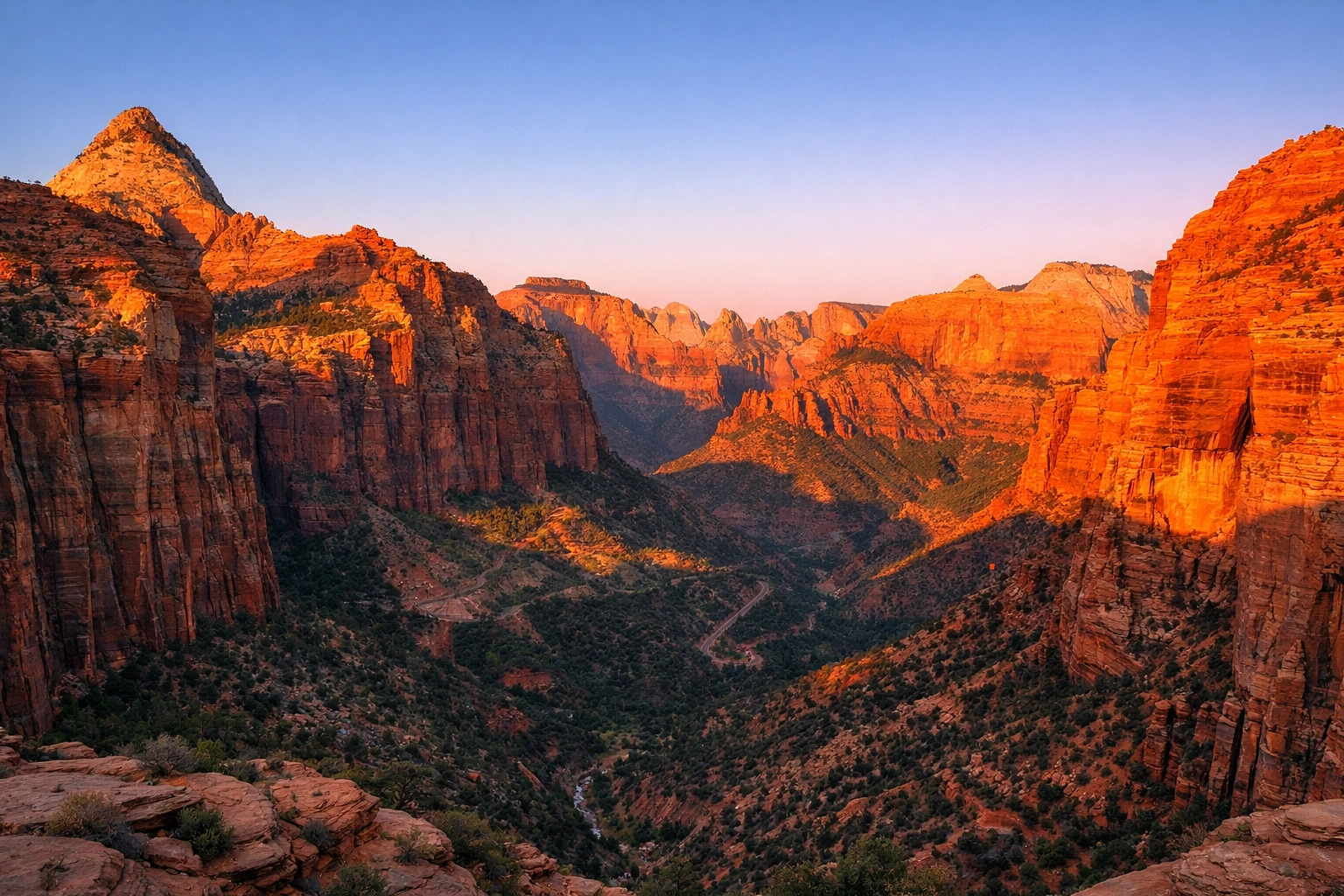 Golden sunrise over Zion National Park cliffs, one of the best sunrise spots in the US.
