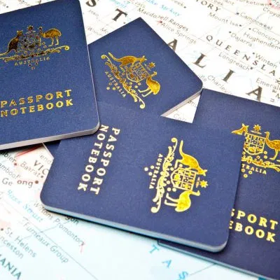 Australian passports resting on a map, symbolizing the global mobility and security of citizenship.