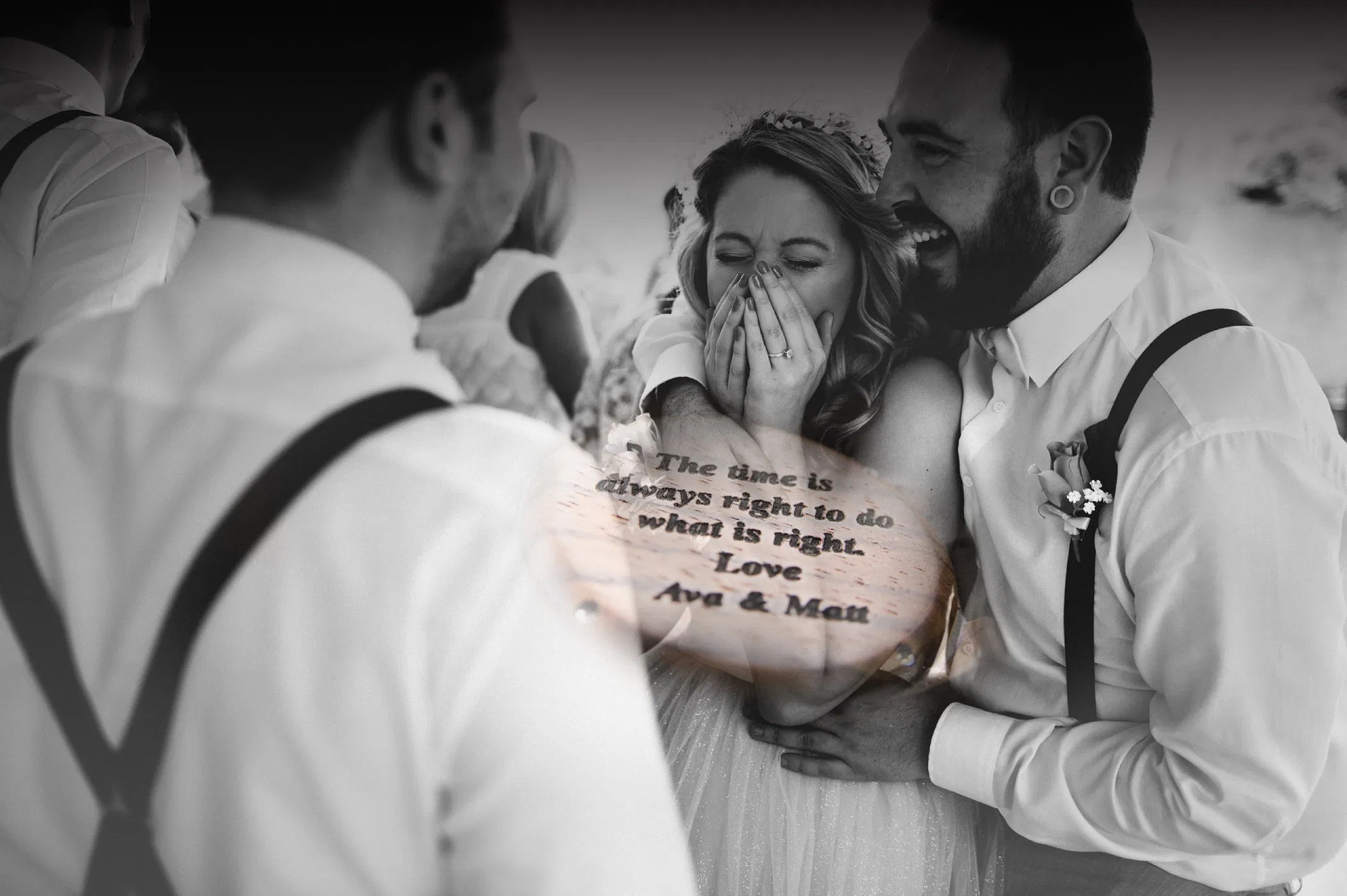 Joyful wedding moment with a happy couple and groomsmen