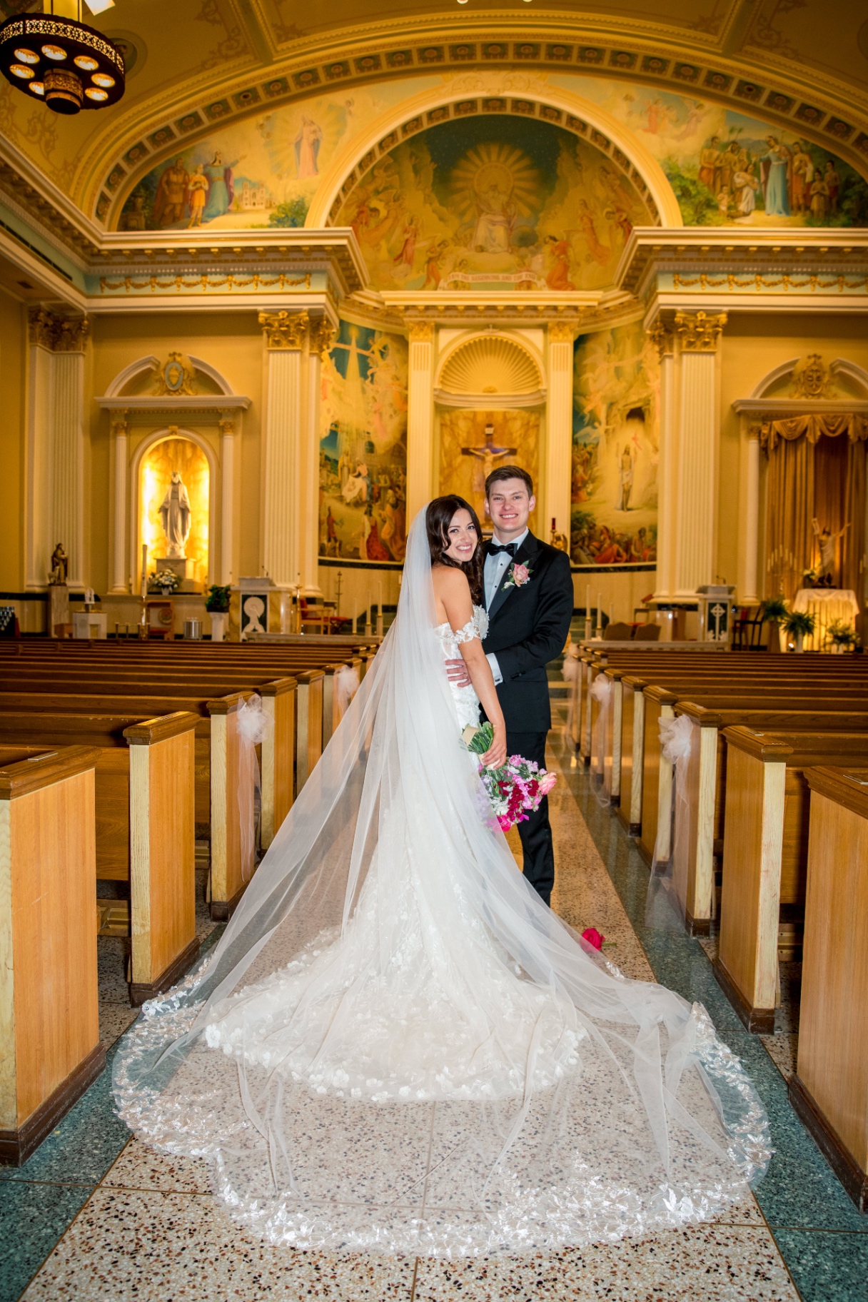Leighanna and Brian share a timeless portrait at the church altar