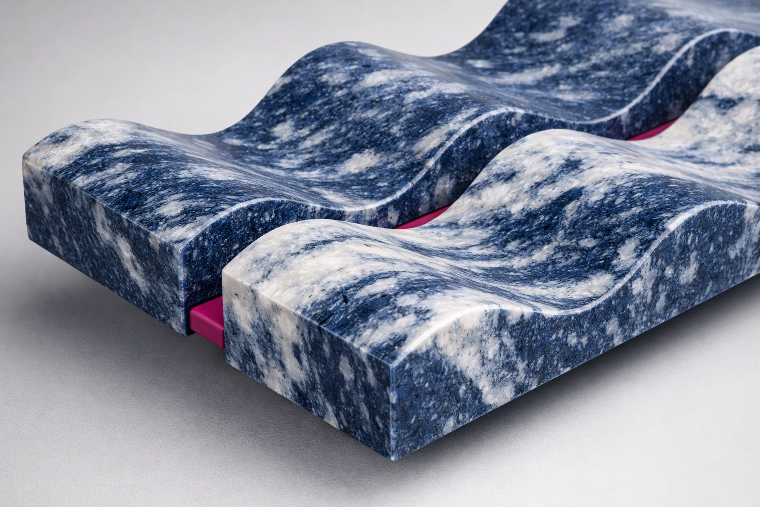 Close-up of marbled recycled plastic battens on a Classic Galleria Seat showing precision CNC cutting.