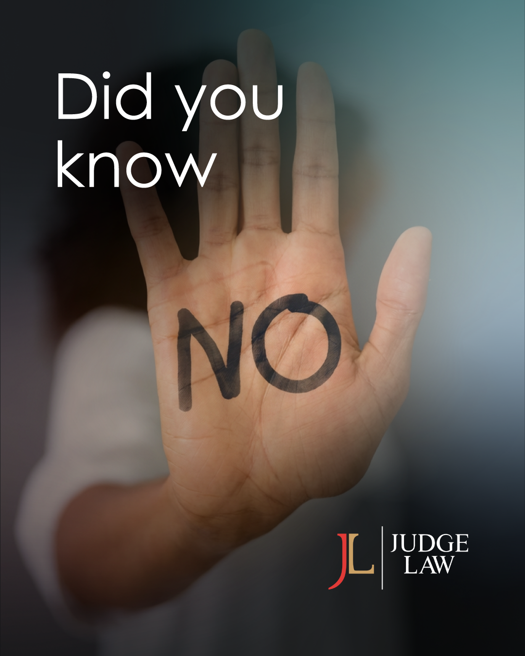 A person's hand with 'NO' written on the palm