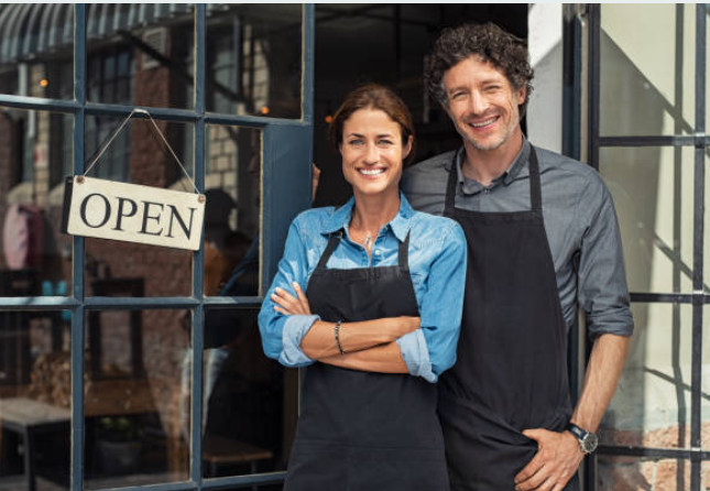 Business Owners in Doorway