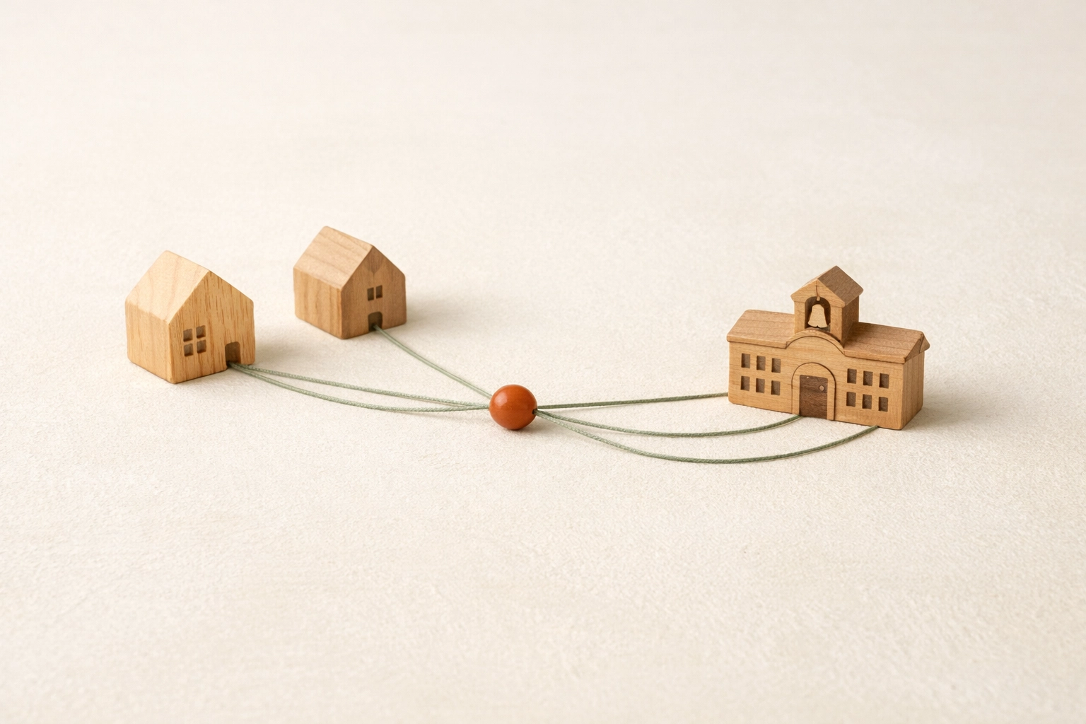 Minimal logistics layout with two house tokens and a school token connected by sage lines on a cream textured surface