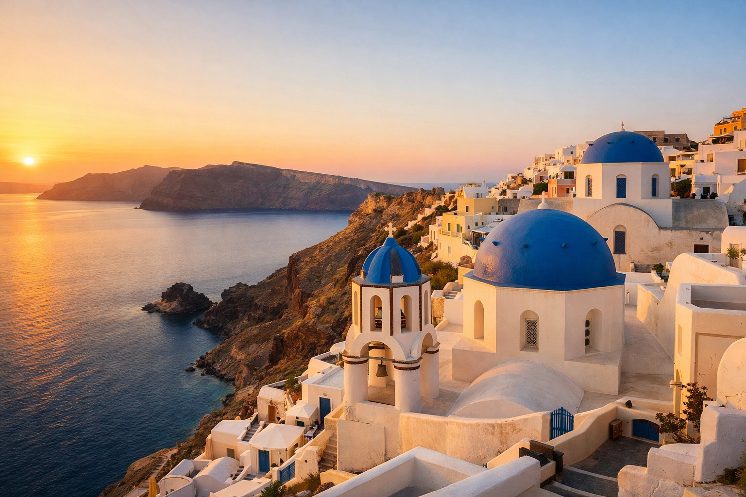 Top 10 Iconic Instagrammable Places You Need to Visit Before Your Battery Dies 1 Iconic blue-domed churches in Oia, Santorini, at sunrise, one of the best photography locations in Greece.