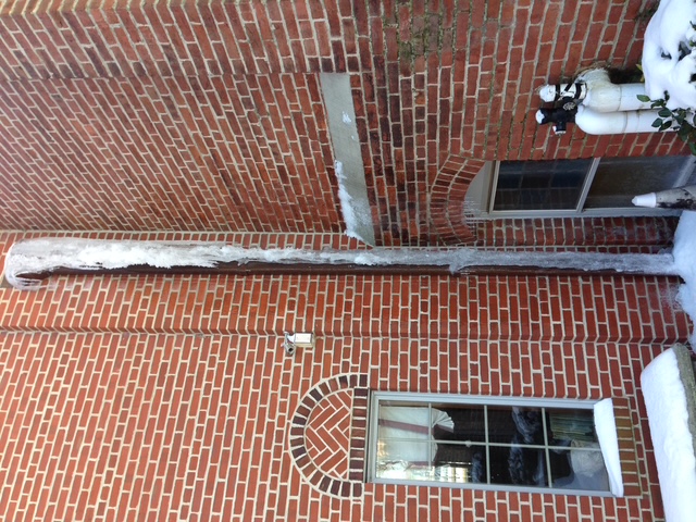 Large Icicle Formation on Downspout