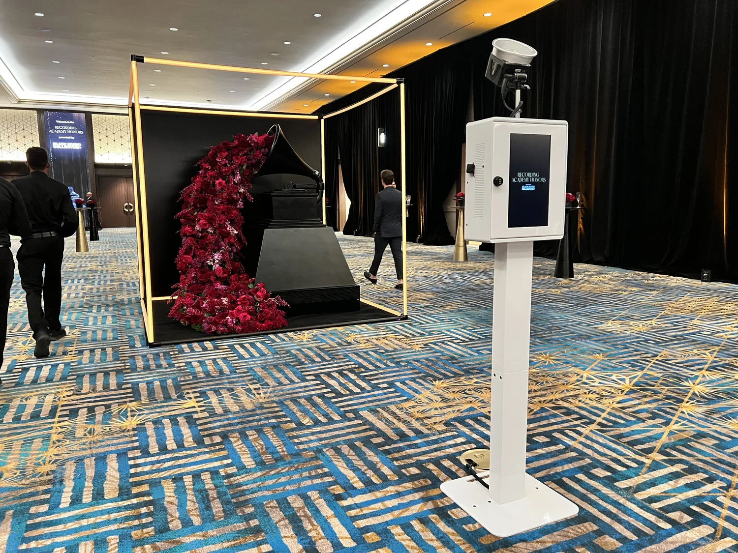 Grammy-style floral installation photo moment at high-energy brand activation (event photo booth experience)