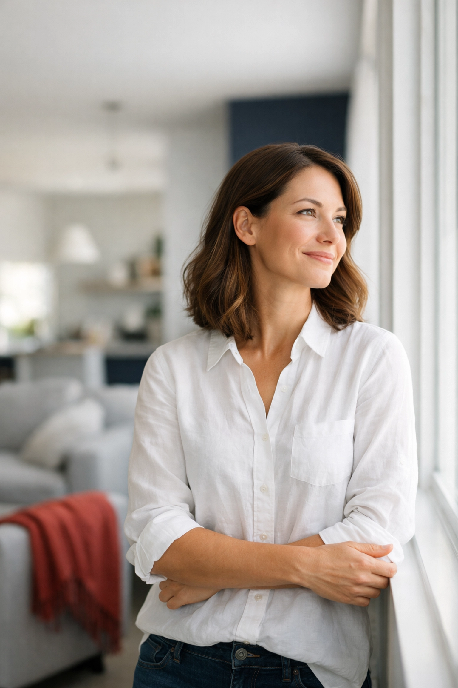 Woman smiling toward a bright future after learning how to improve her credit score.