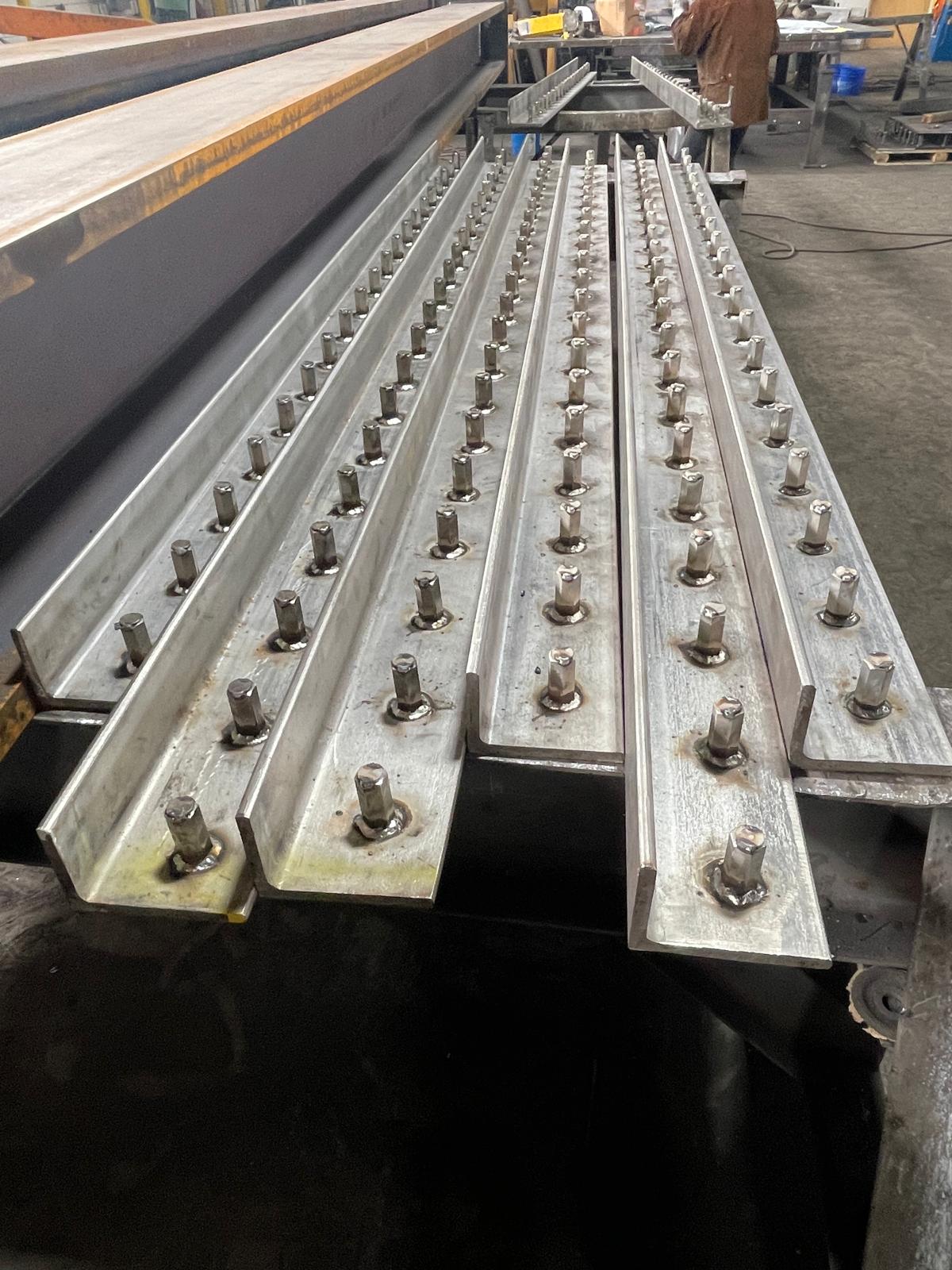 Steel angles with welded steel studs