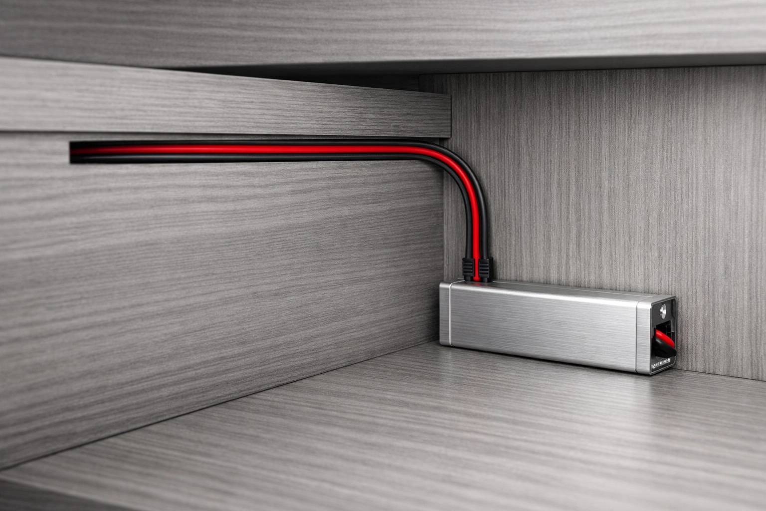 Concealed LED wiring and driver installation inside custom cabinetry for a sleek look.