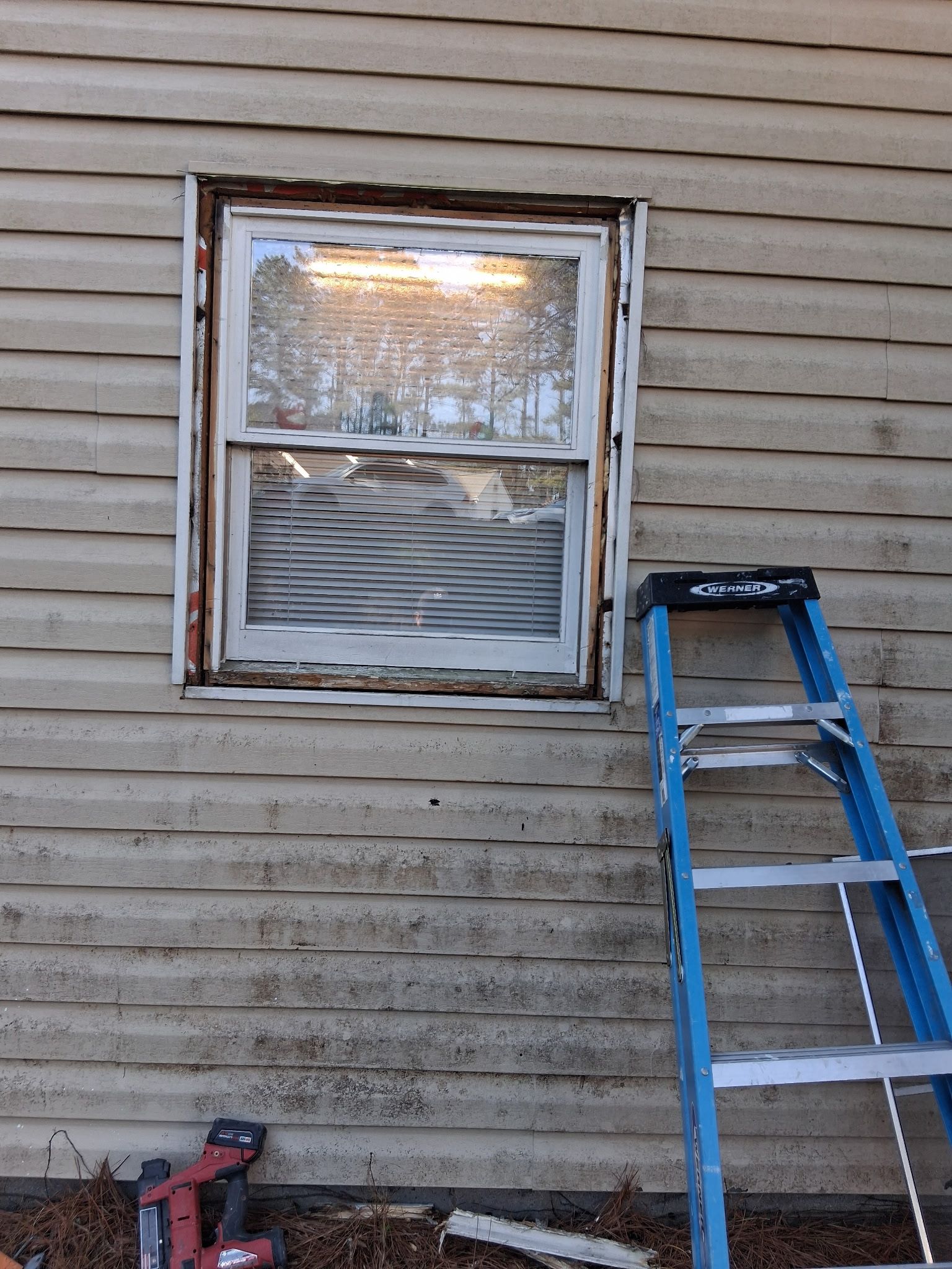 Repairs in progress on the window trim