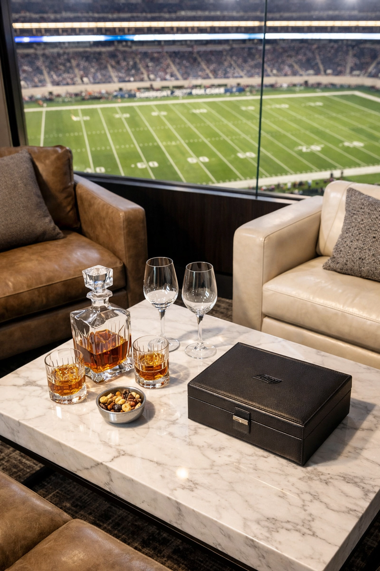 Luxury corporate hospitality lounge in a stadium suite featuring premium amenities and field views.