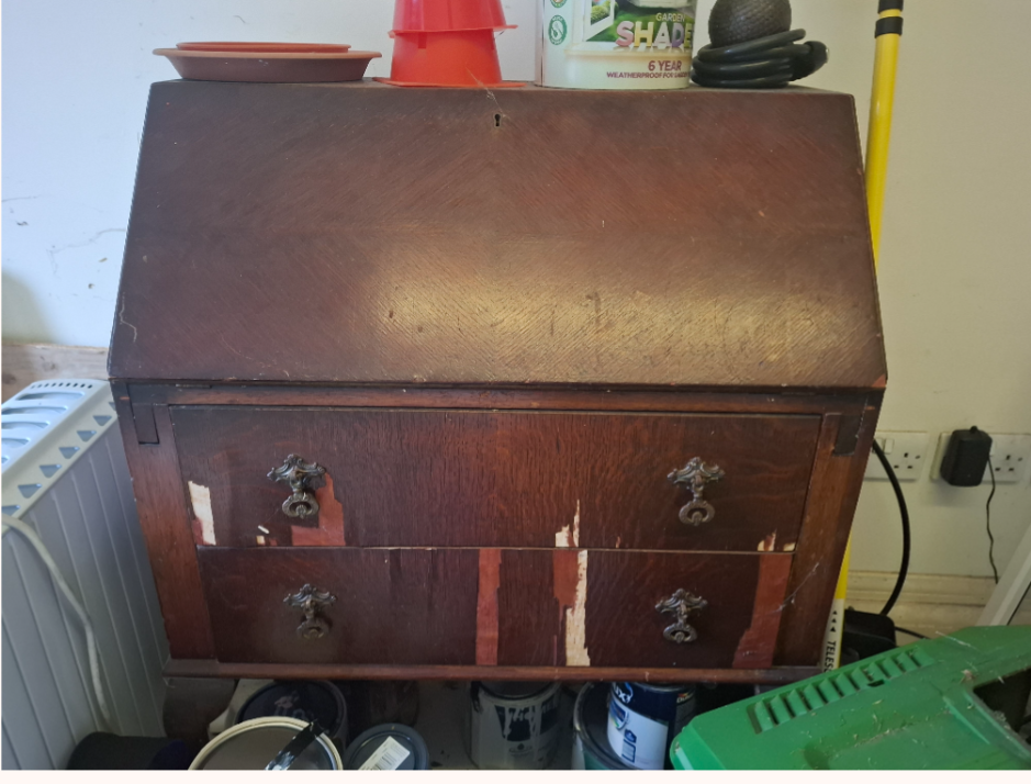 Vintage wooden bureau in need of repair