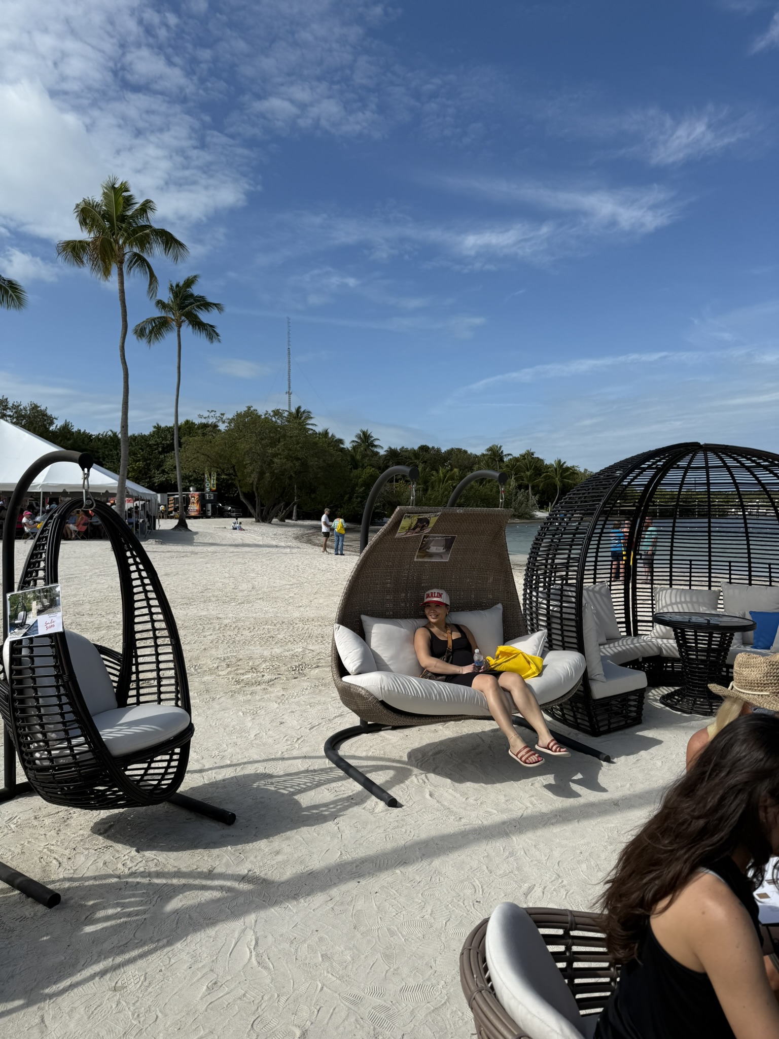 Stylish swinging chairs and daybeds on the beach—resort-level comfort with durable, weather-ready materials ideal for the Florida Keys lifestyle