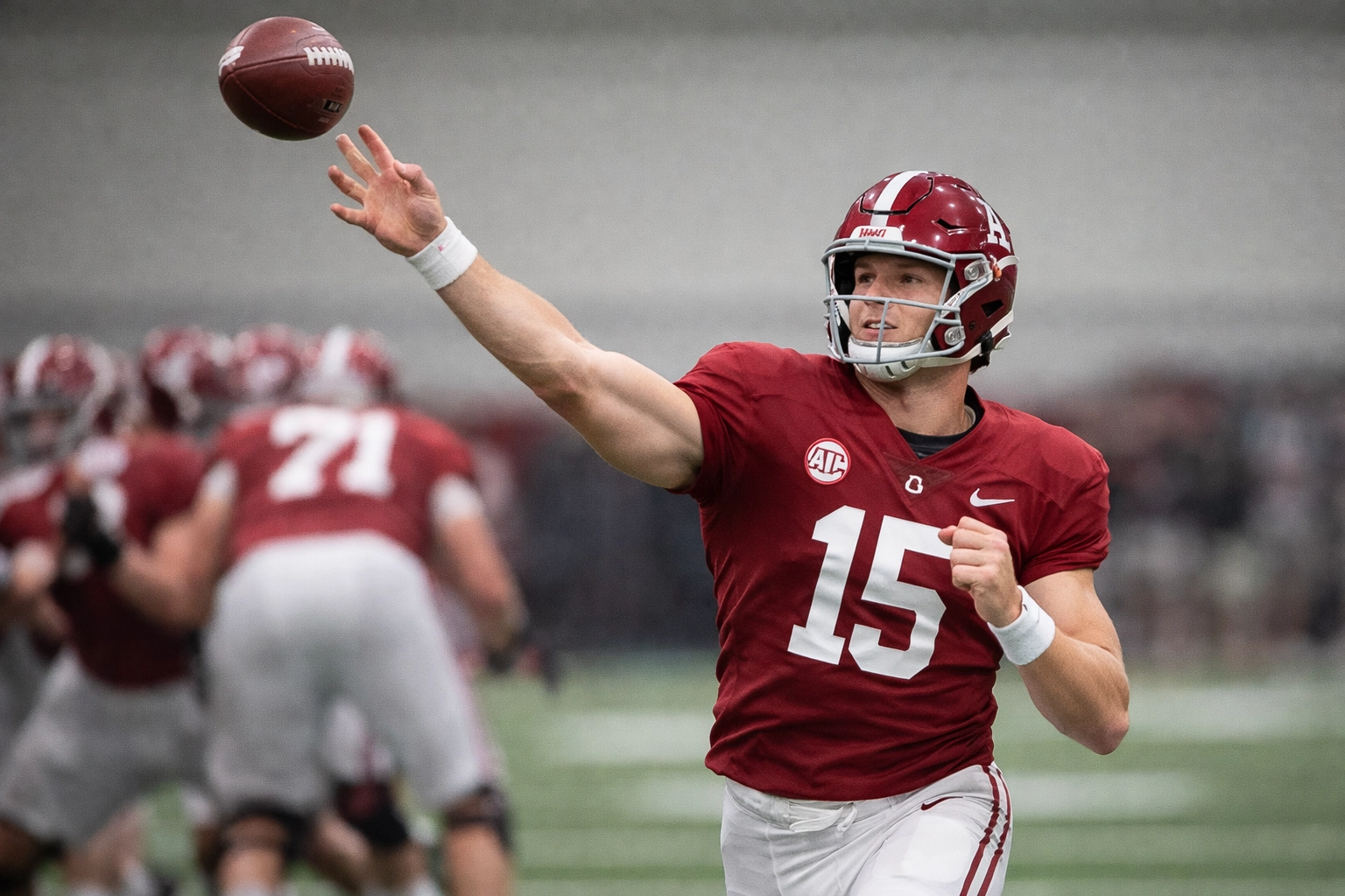 Quarterback Ty Simpson throwing during draft showcase workouts.