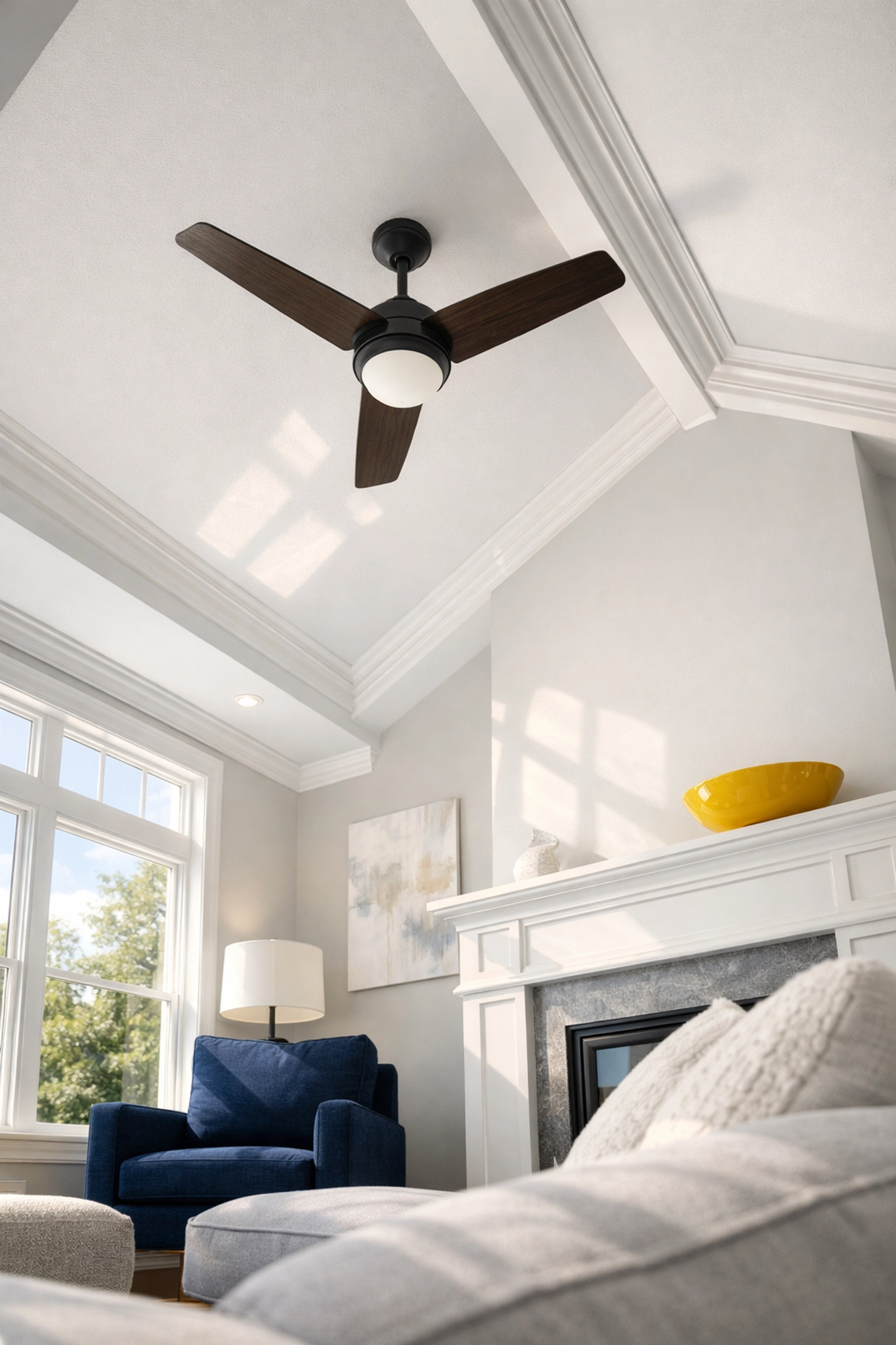 Modern Westford living room with high ceilings and a fan, ready for professional deep cleaning services.