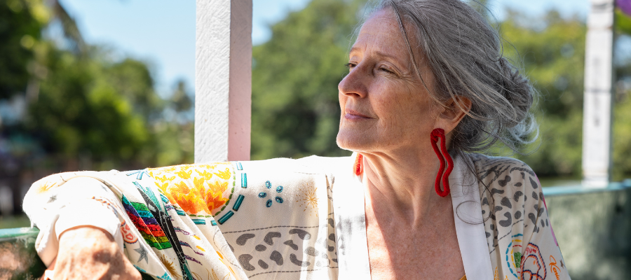woman-sitting-outdoors-holistic-care-perimenopause.png