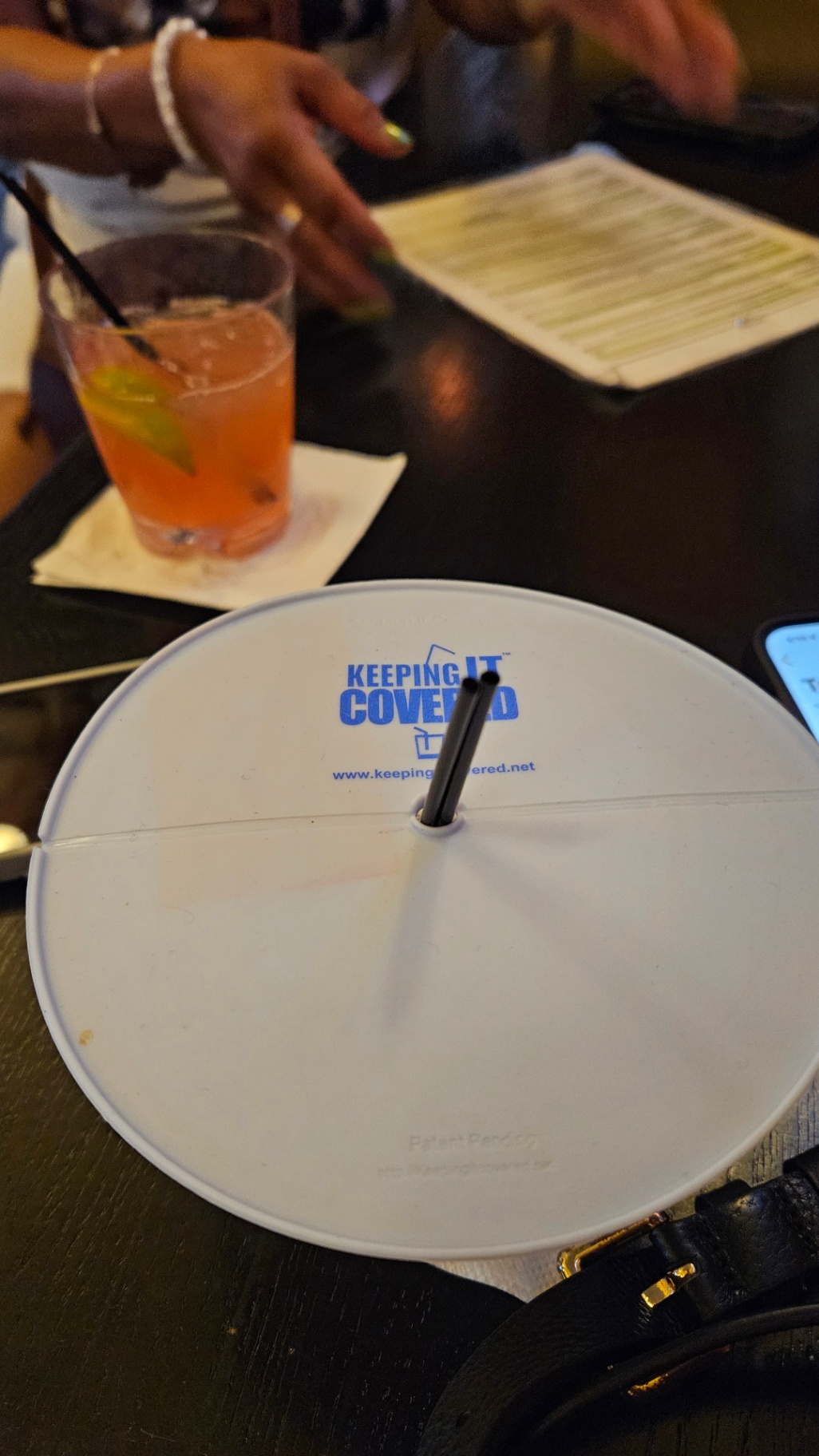 Keeping It Covered lid on restaurant drink