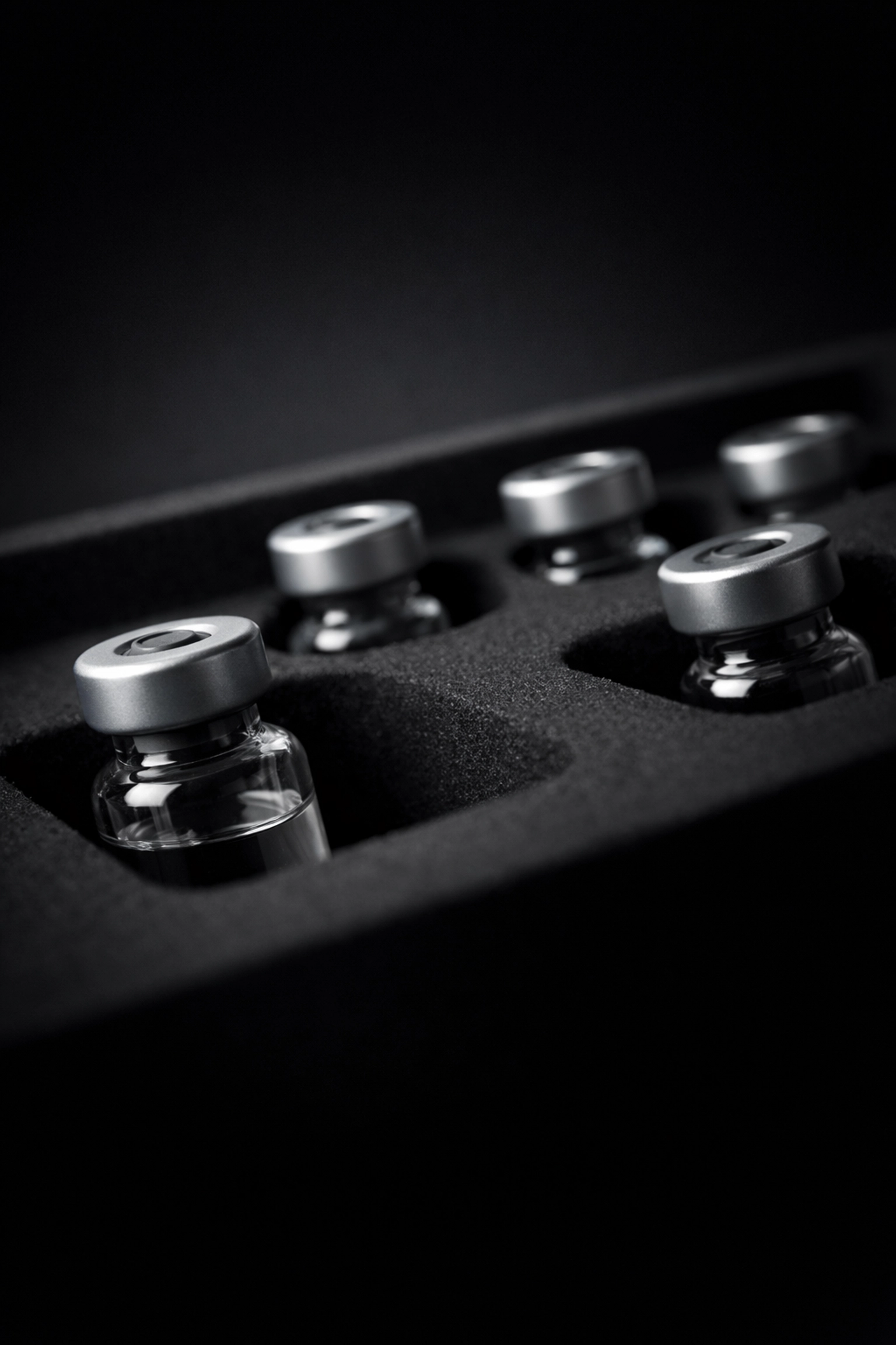 Secure storage of research peptide vials in a protective lab-grade foam container.