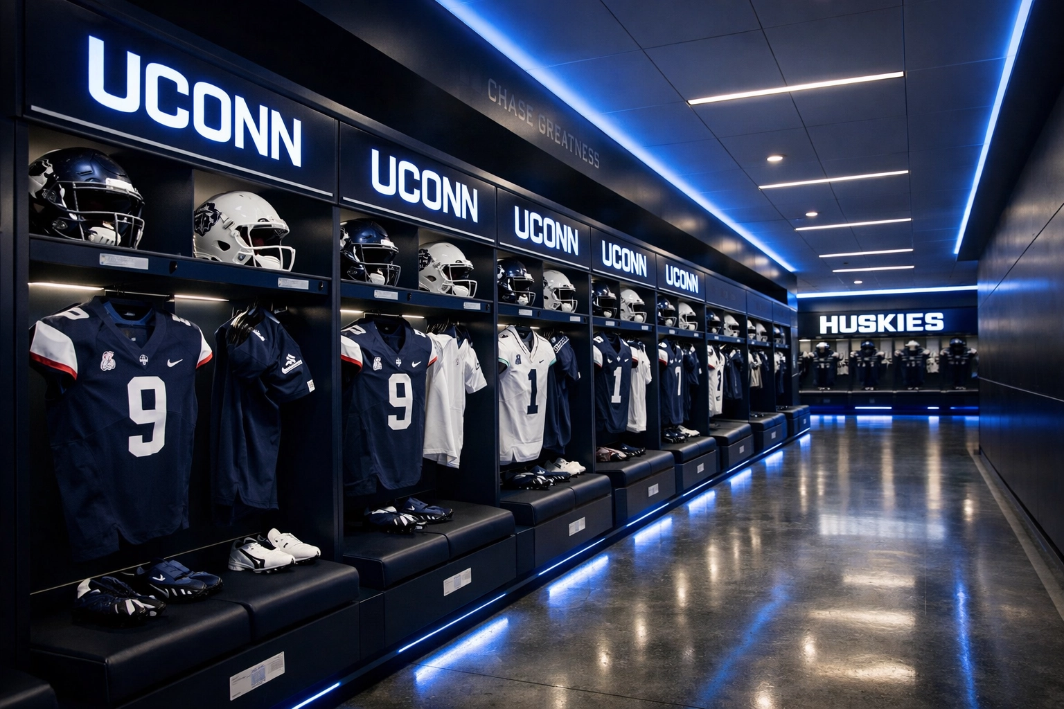 UConn football locker room with blue lockers and modern facilities under Jason Candle
