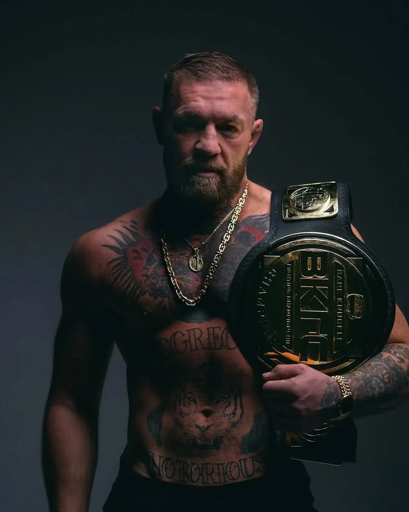 BKFC Champion holding the gold belt