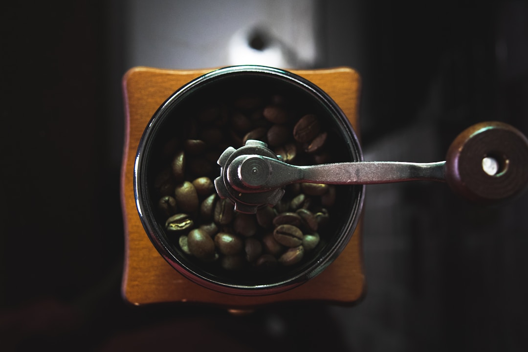 Premium Whole Coffee Beans in Manual Grinder