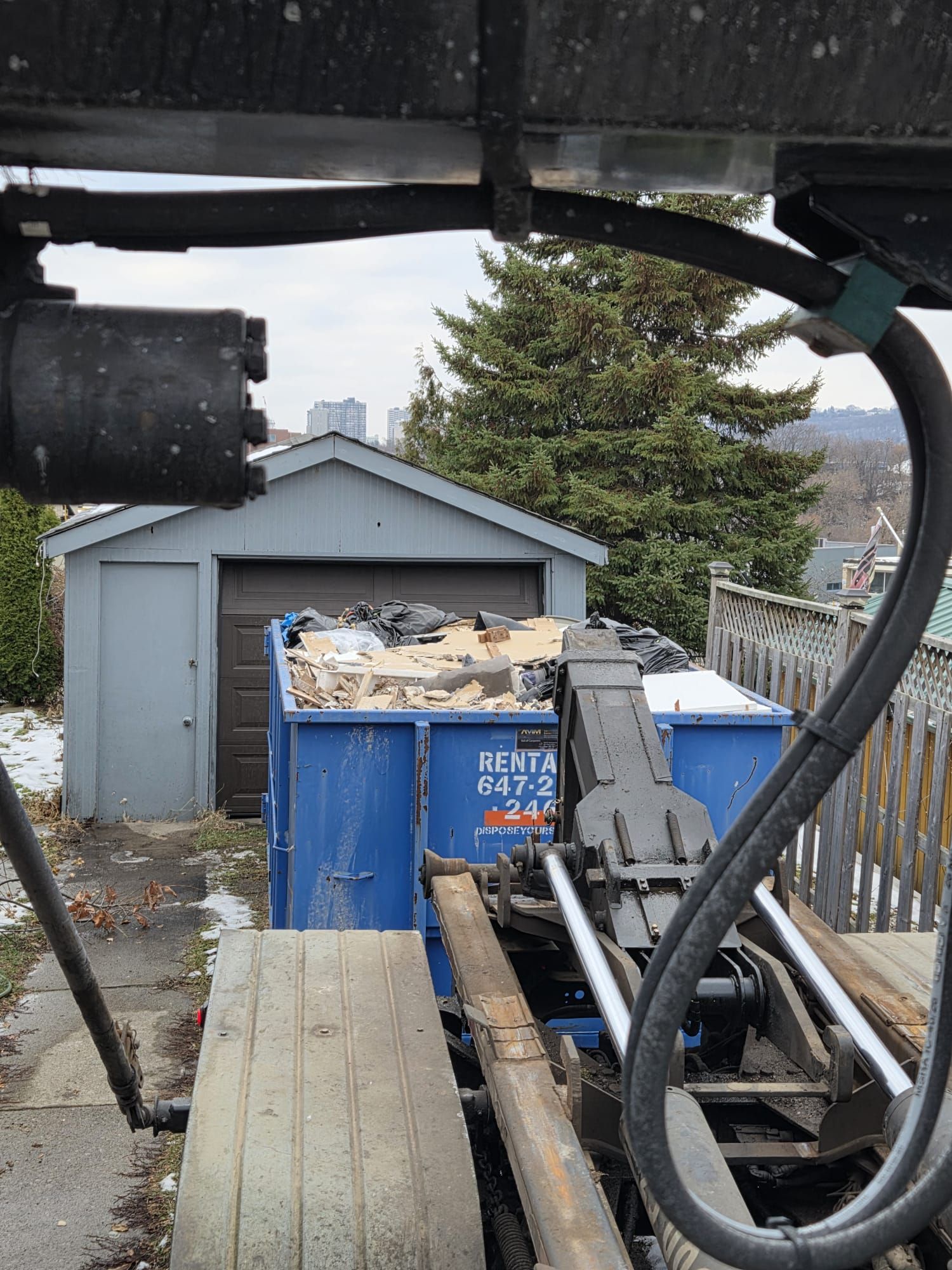 Roll Off Bin Rental North York: Pro Tips bin-pickup-residential-driveway.jpg