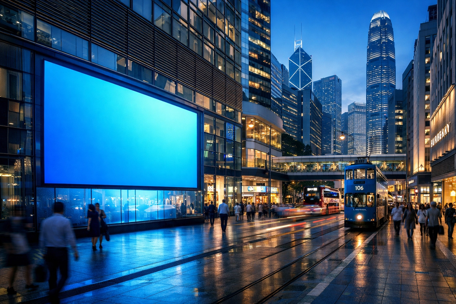 Digital out-of-home screen in a busy Hong Kong commercial district showcasing RAMM's global advertising reach.