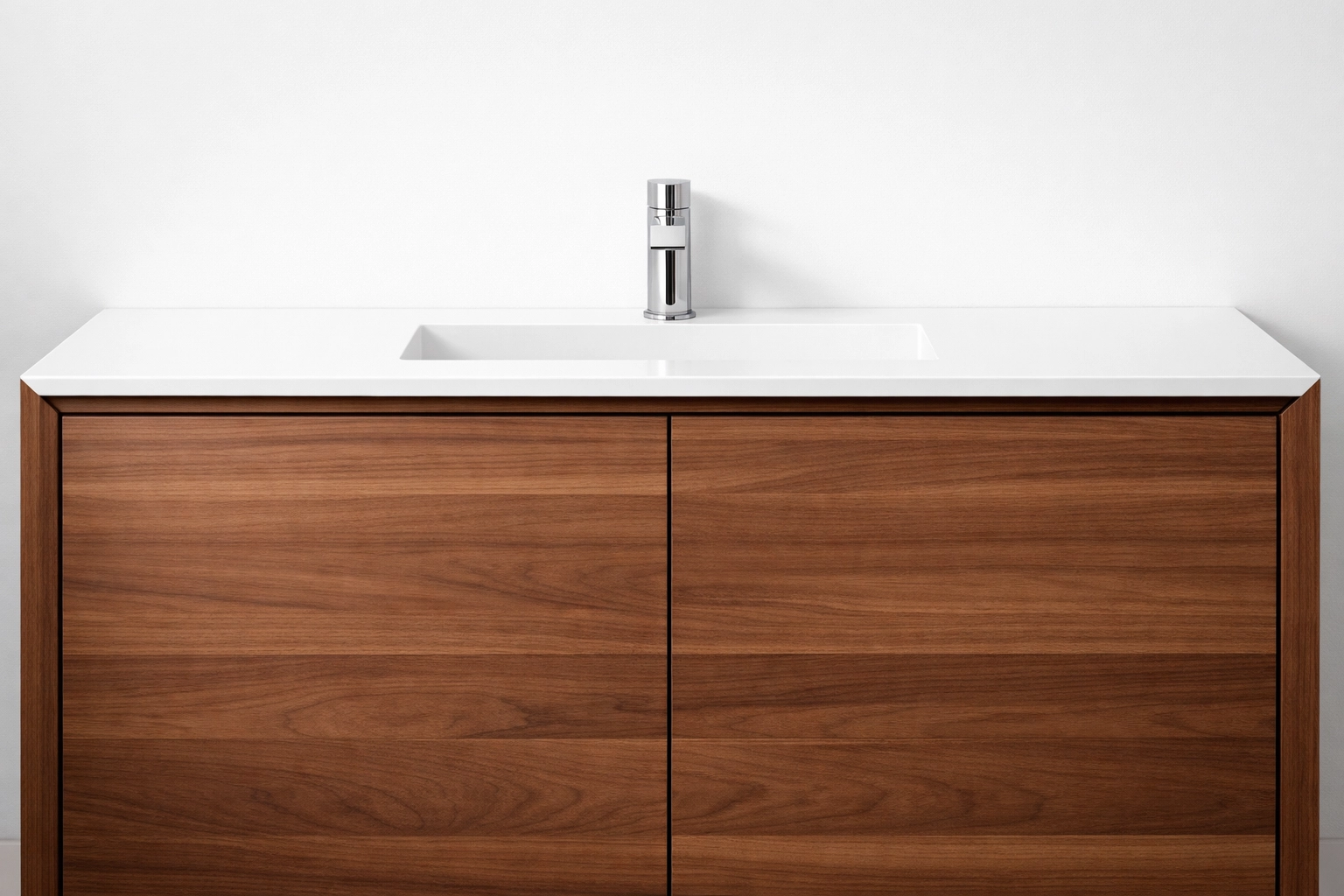 Minimalist walnut slab-door bathroom vanity designed for easy cleaning and modern style.