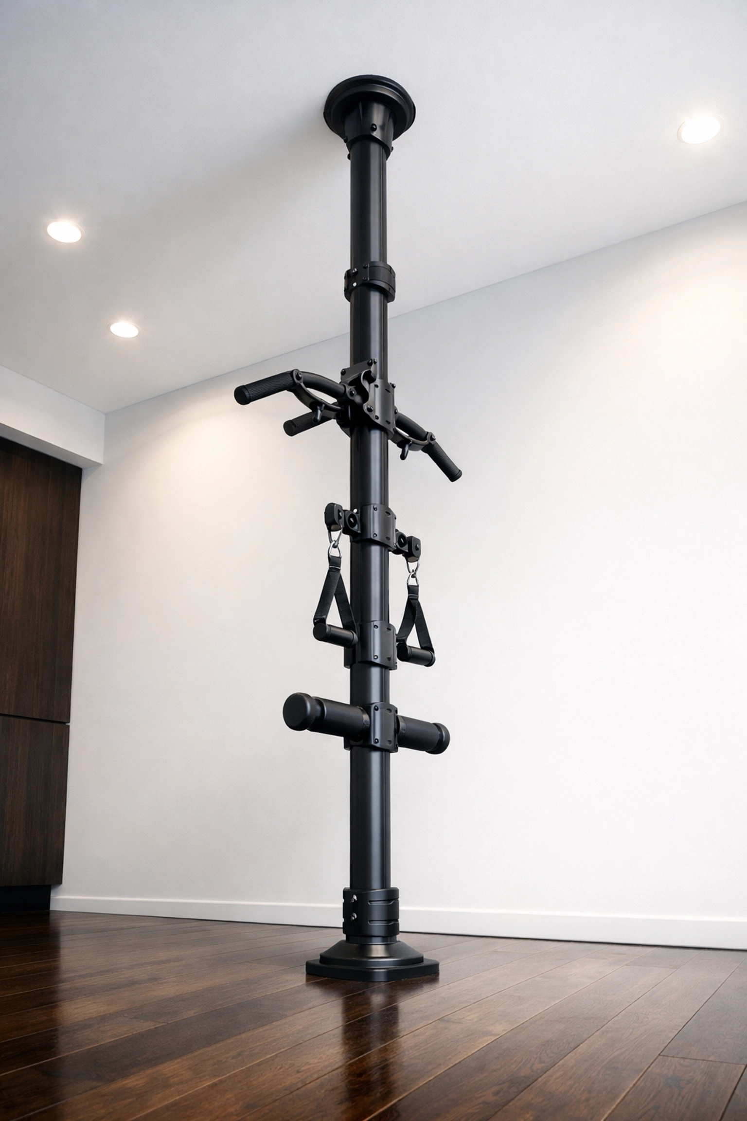 A vertical floor to ceiling gym rail for home resistance training without damaging walls.